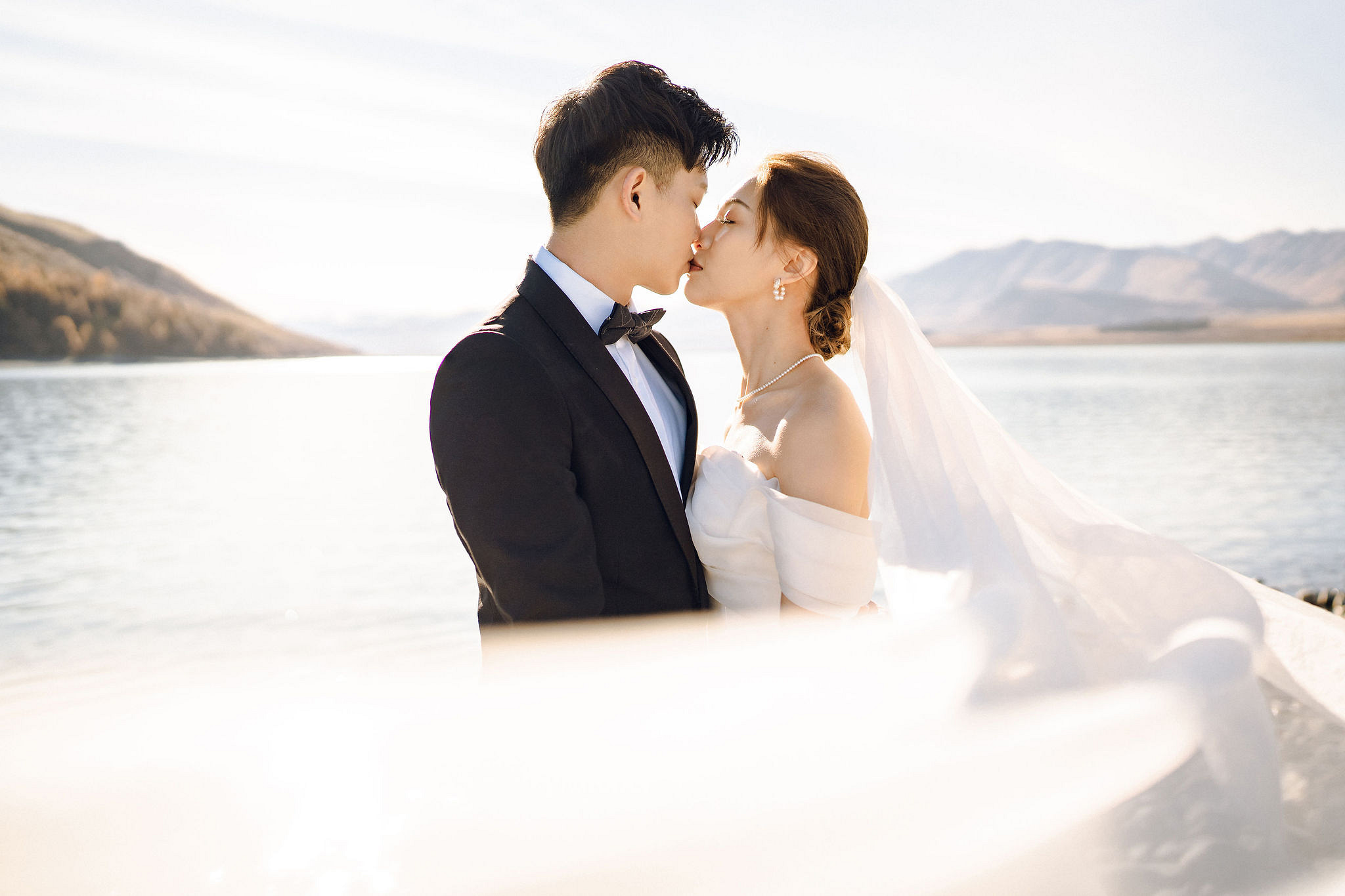 New Zealand Pre-Wedding Photoshoot | Alpaca Farm, Mt John, Lake Tekapo, Mount Cook National Park, Glacier Lake & Omarama Clay Cliffs at Lake Tekapo, Mount Cook National Park & Glacier Lake pre-wedding photo
