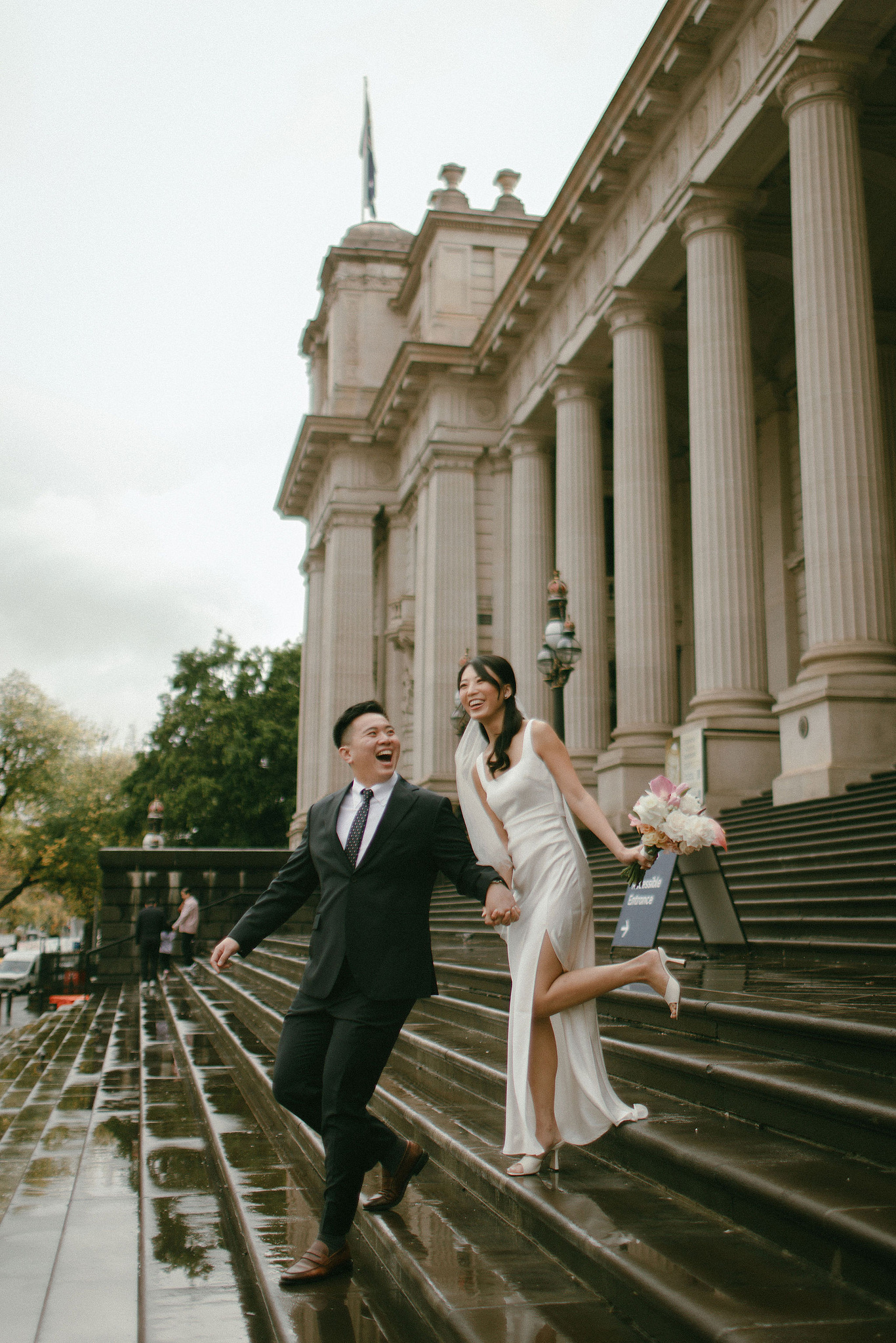 Melbourne Pre-Wedding Photoshoot | Parliament House, Fitzroy Gardens, Melbourne Streets & Half Moon Bay at Parliament House pre-wedding photo