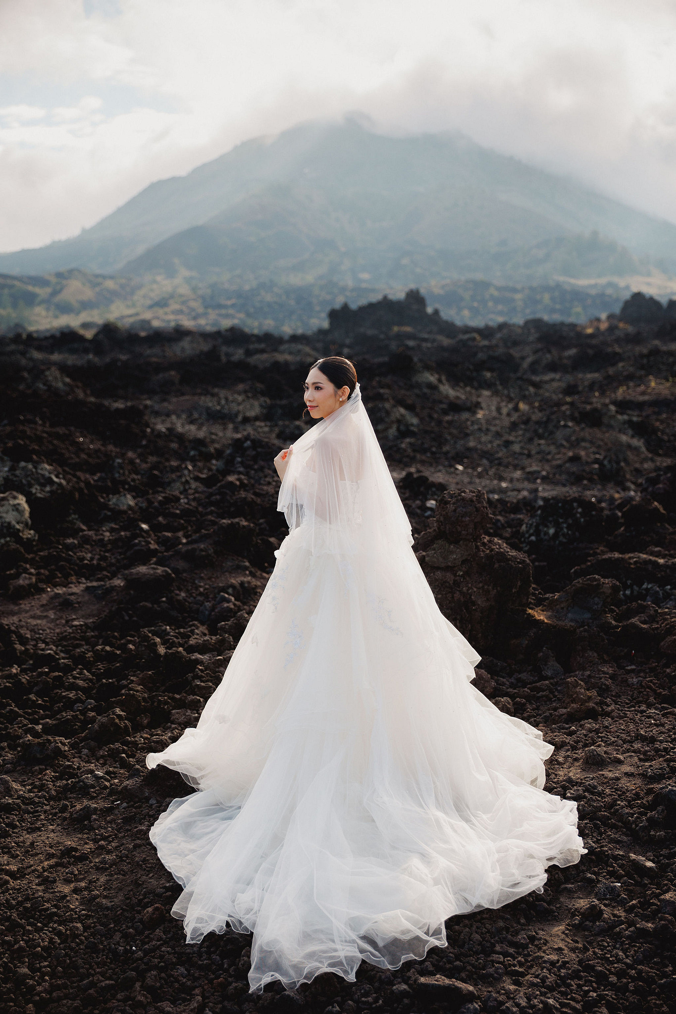 Bali Pre-Wedding Photoshoot | Mt. Batur Lava Fields, Blangsinga Waterfall & Balangan Beach at Mt. Batur Lava Fields pre-wedding photo