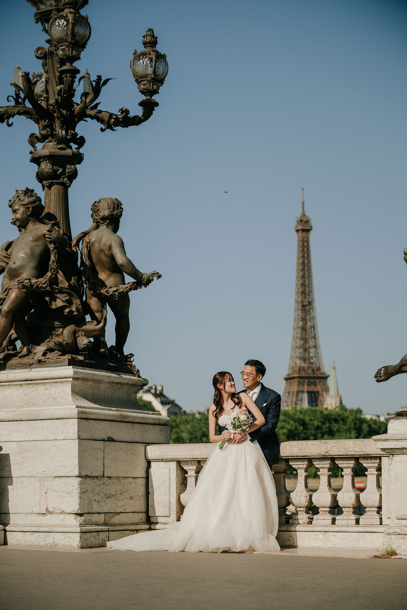 Paris Pre-Wedding Photoshoot | Place du Trocadéro, Port Debilly, Petit Palais, Pont Alexandre III, Parisian Café & Louvre Pyramid at Pont Alexandre III pre-wedding photo