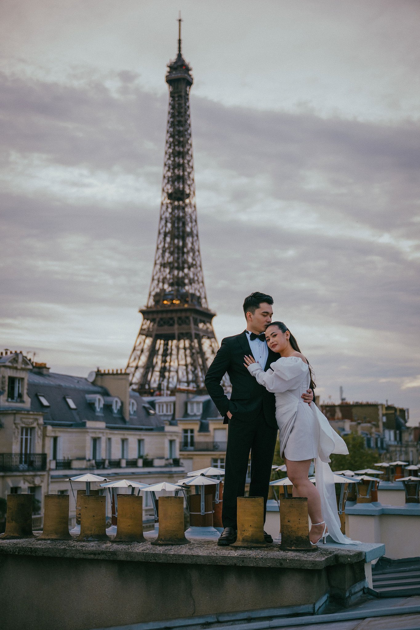 Paris Pre-Wedding Photoshoot | Trocadéro, Vintage Car, Parisian Café, Paris Rooftop & Louvre at Paris Rooftop pre-wedding photo