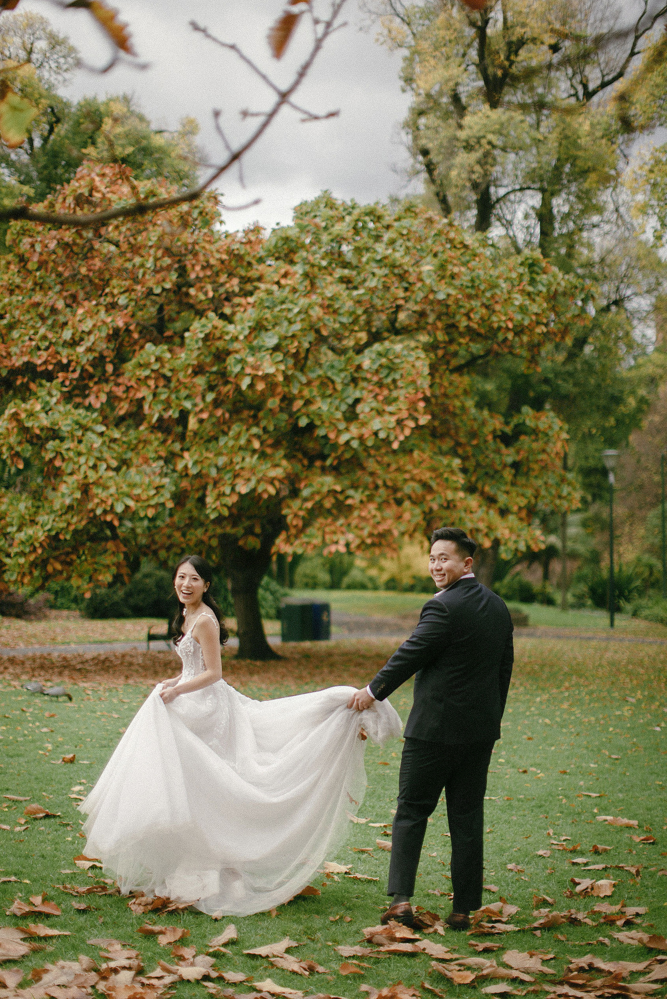 Melbourne Pre-Wedding Photoshoot | Parliament House, Fitzroy Gardens, Melbourne Streets & Half Moon Bay at Fitzroy Gardens pre-wedding photo