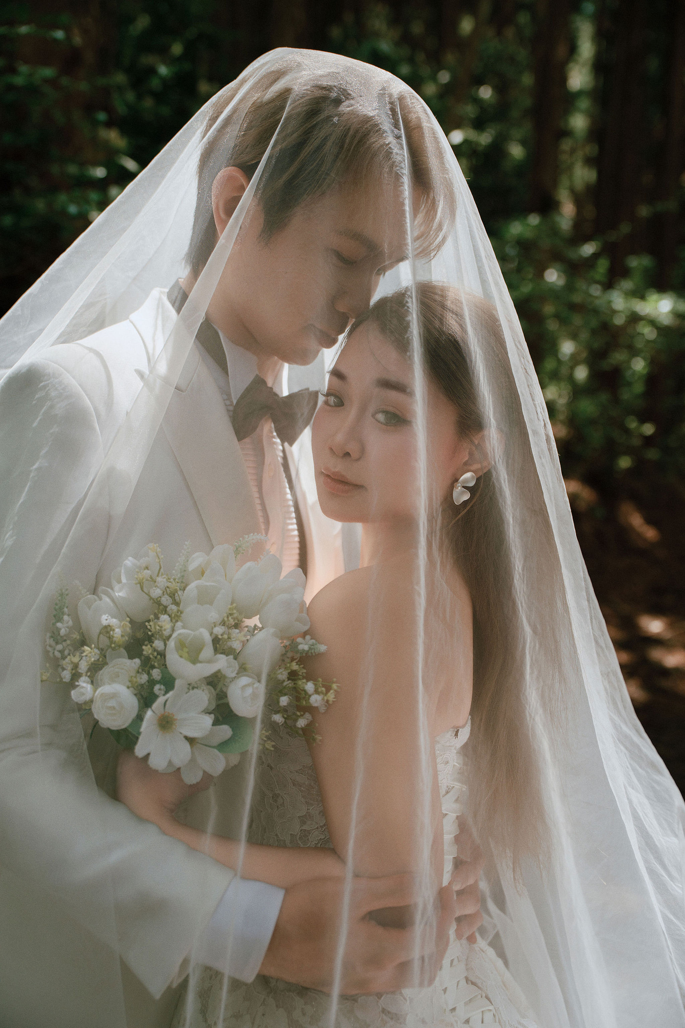 Jeju Pre-Wedding Photoshoot | Sangye-dong Forest, Yerae Ecological Park & Hyeopjae Beach at Sangye-dong Forest pre-wedding photo