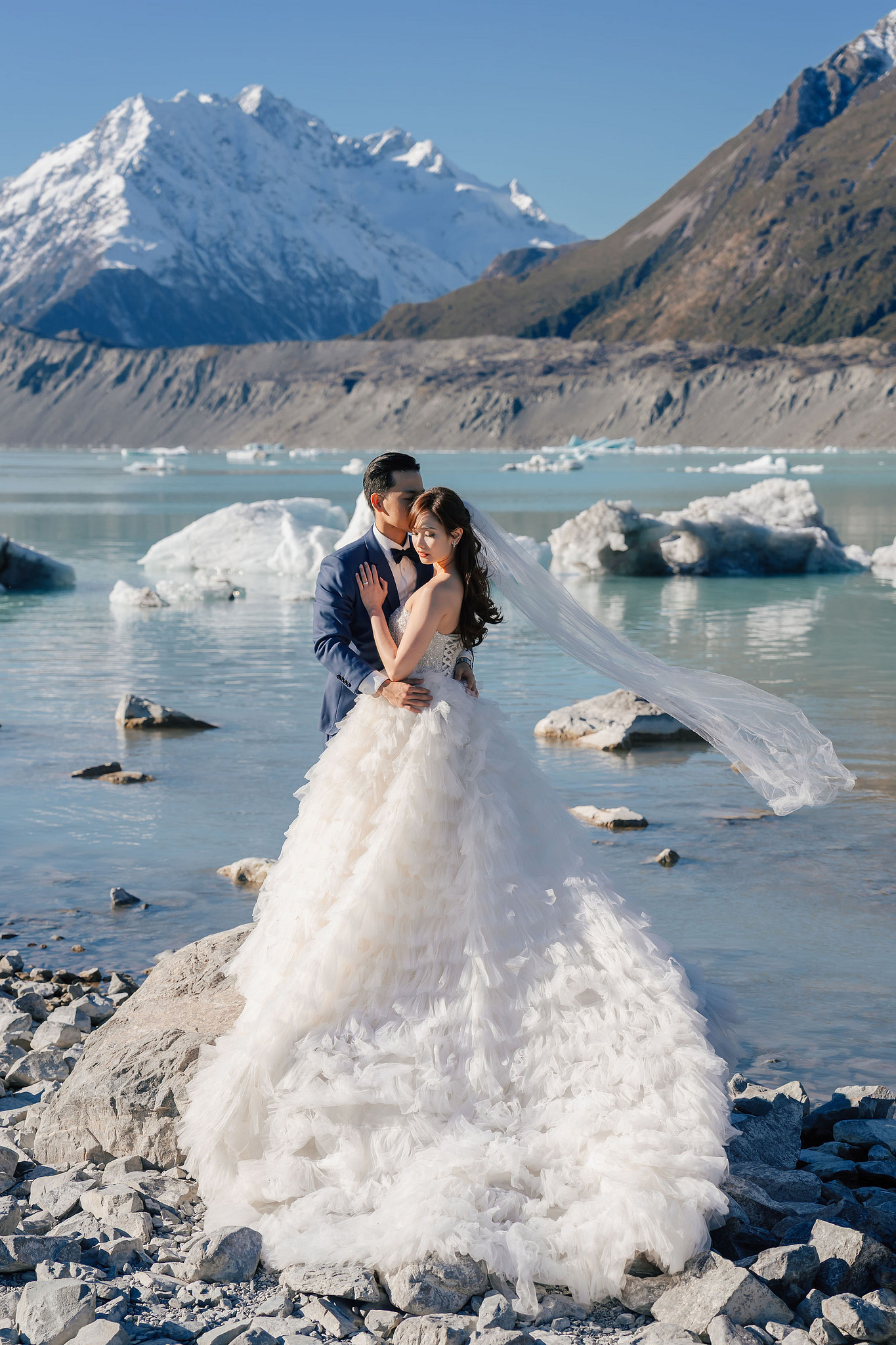 New Zealand Pre-Wedding Photoshoot | Coromandel Peak, Lake Wakatipu & Queenstown, Skippers Canyon, Lake Tekapo, Mount Cook National Park & Glacier at Glacier pre-wedding photo