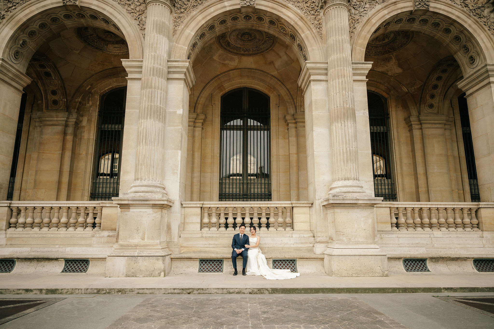 Paris Pre-Wedding Photoshoot | Place du Trocadéro, Bir-Hakeim Bridge, Louvre Pyramid, Tuileries Garden & Montmartre at Louvre Pyramid pre-wedding photo
