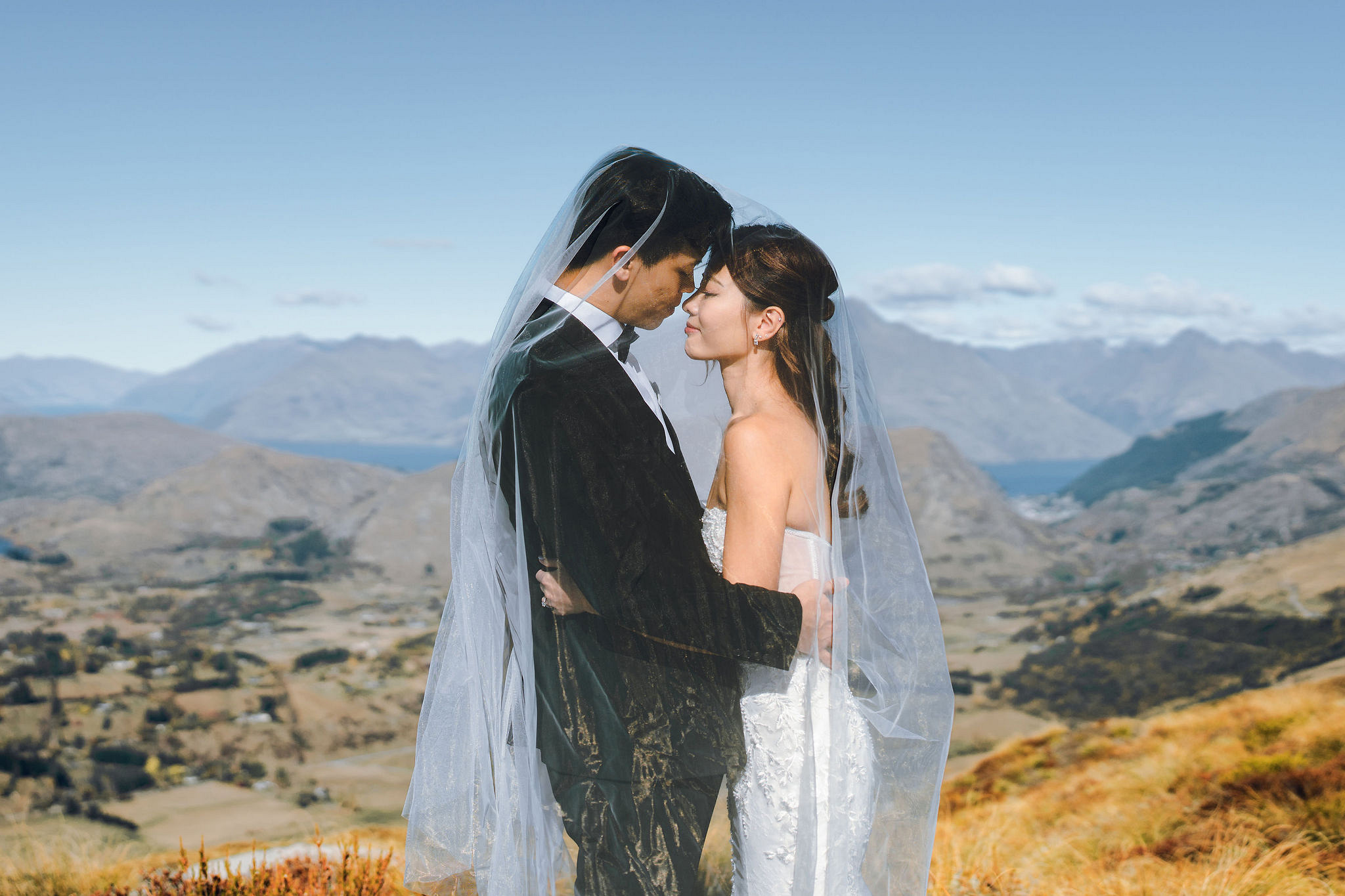 New Zealand Autumn Pre-Wedding Photoshoot Twin Peak Skippers Canyon Alpaca Farm Hilltop Cardrona Night Shoot Kombi Van at Skippers Canyon pre-wedding photo
