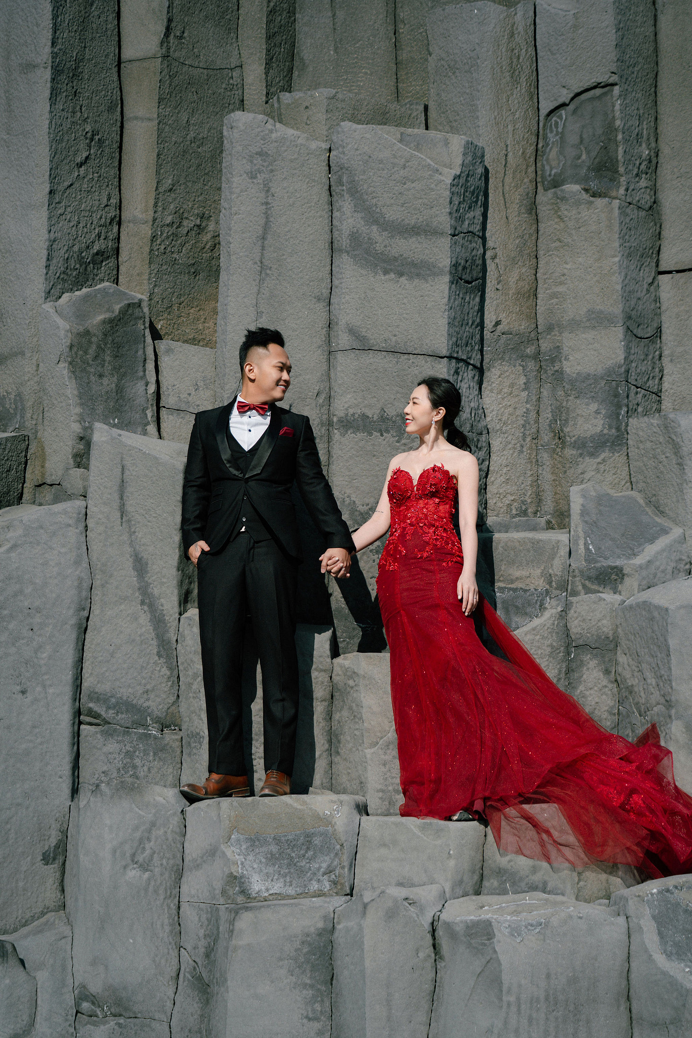 Iceland Pre-Wedding Photoshoot | Hallgrimskirkja, Skogafoss, DC Plane Wreck & Black Sand Beach at Black Sand Beach & Vik Church pre-wedding photo