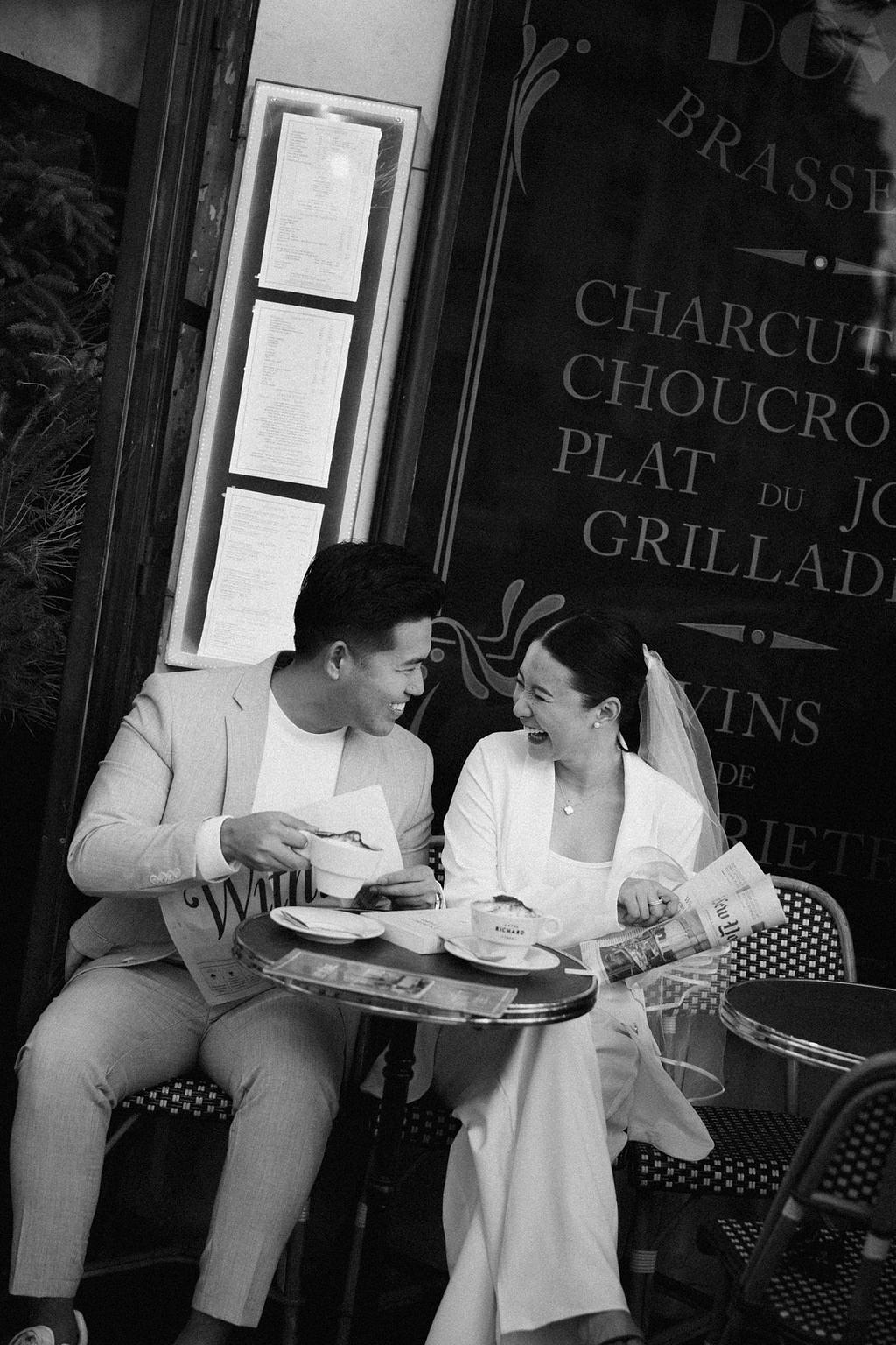 Paris Pre-Wedding Photoshoot with Eiﬀel Tower Louvre Museum Parisian Cafe Vintage Car Rooftop Night at Parisian Café pre-wedding photo