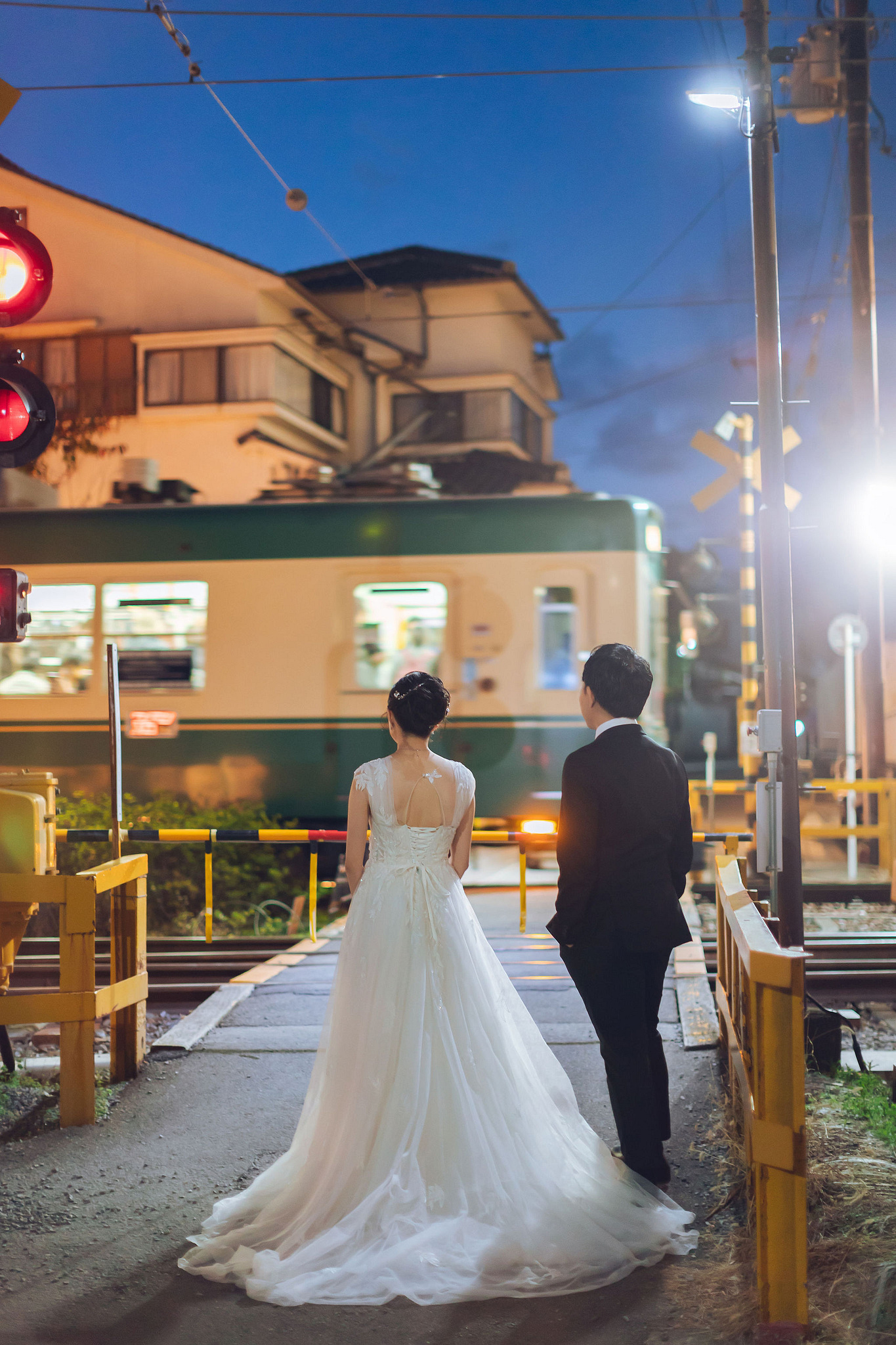 Kyoto Pre-Wedding Photoshoot | Traditional Higashiyama, Arashiyama Hills & Nighttime Railway at Nighttime Railway Crossing pre-wedding photo