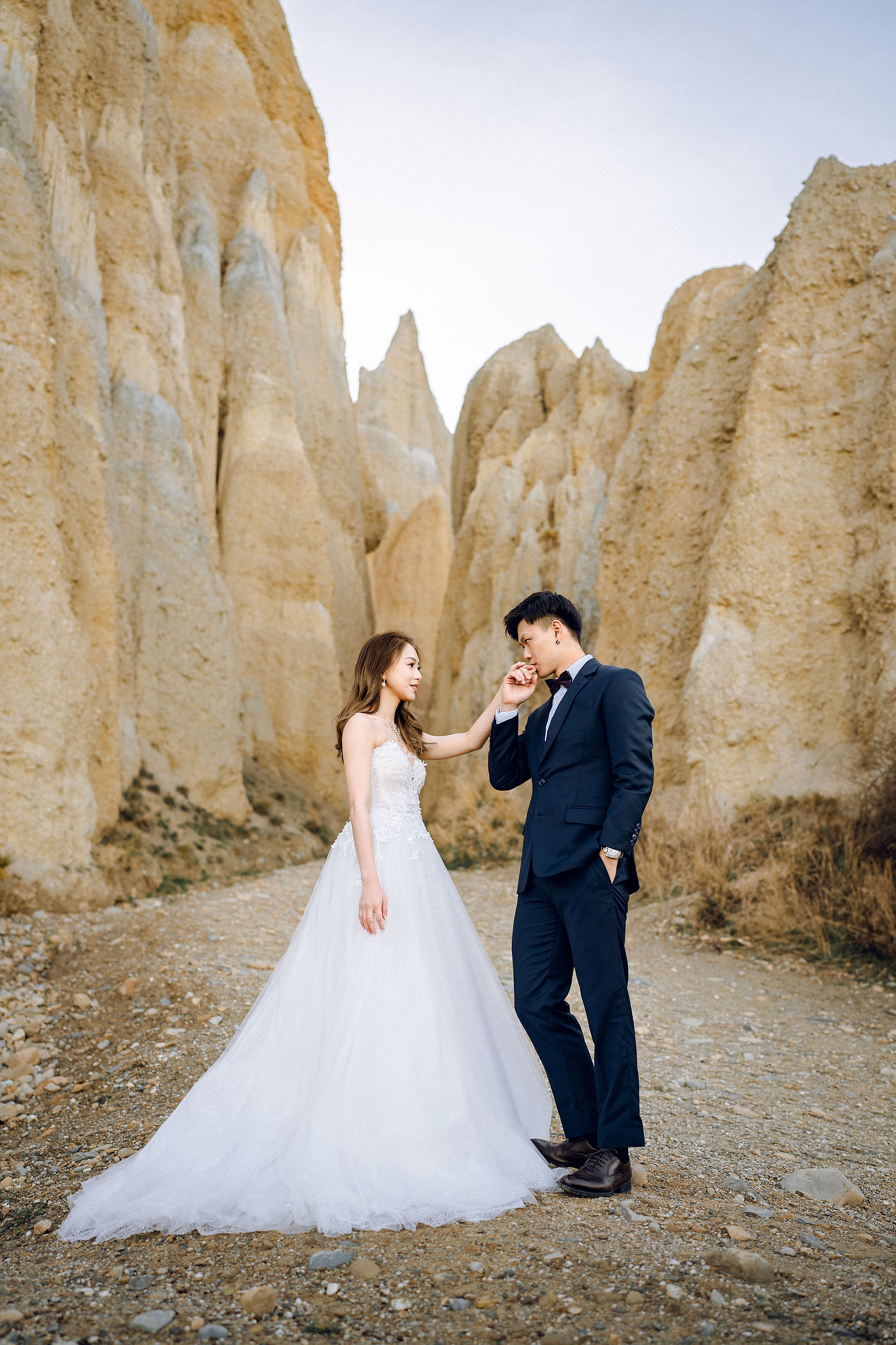 New Zealand Pre-Wedding Photoshoot | Alpaca Farm, Mt John, Lake Tekapo, Mount Cook National Park, Glacier Lake & Omarama Clay Cliffs at Omarama Clay Cliffs pre-wedding photo