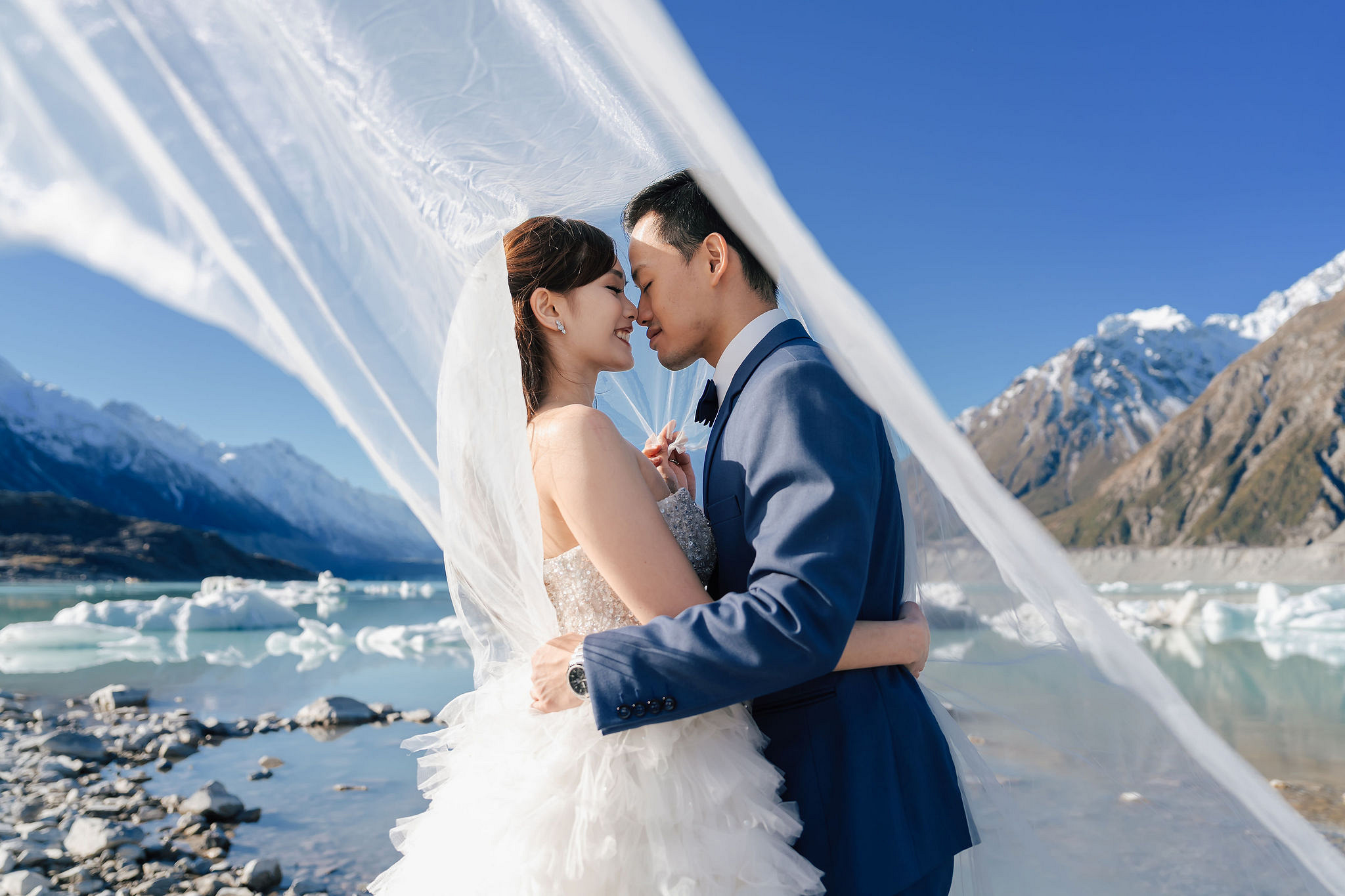 New Zealand Pre-Wedding Photoshoot | Coromandel Peak, Lake Wakatipu & Queenstown, Skippers Canyon, Lake Tekapo, Mount Cook National Park & Glacier at Glacier pre-wedding photo