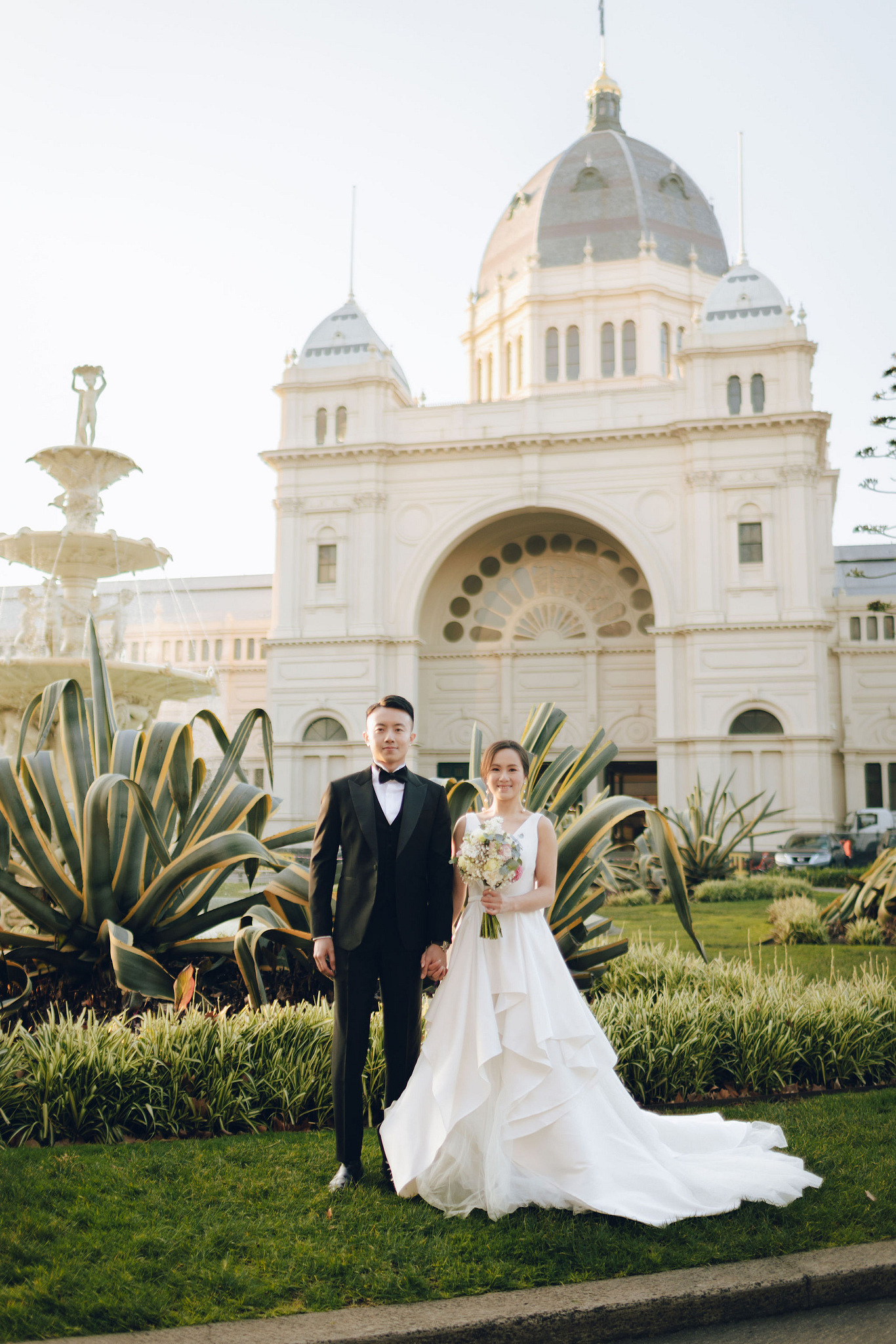 Melbourne Pre-Wedding Photoshoot | Cafe, Redwood Forest, City Streets & Carlton Gardens at Carlton Gardens pre-wedding photo