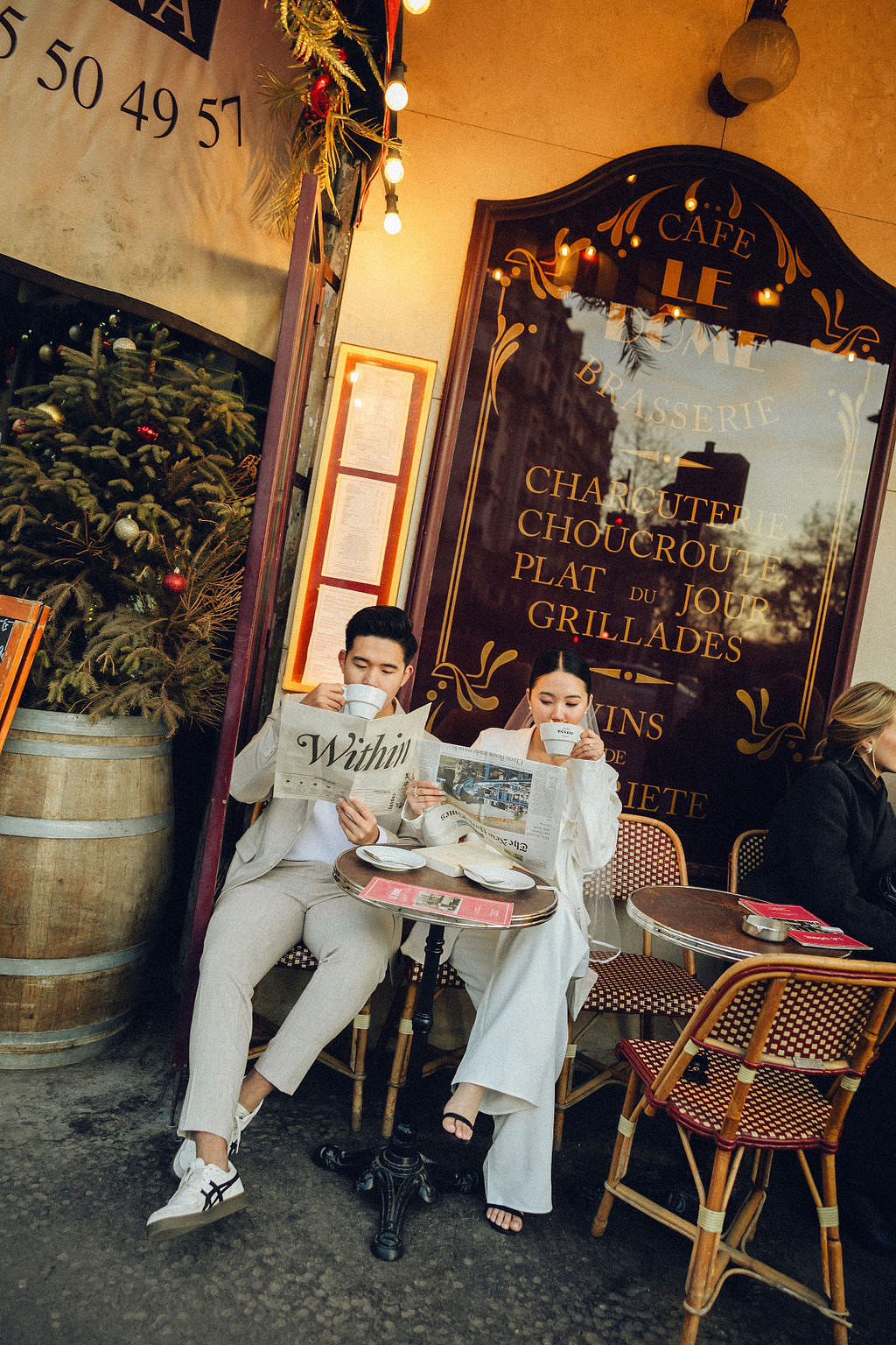 Paris Pre-Wedding Photoshoot with Eiﬀel Tower Louvre Museum Parisian Cafe Vintage Car Rooftop Night at Parisian Café pre-wedding photo