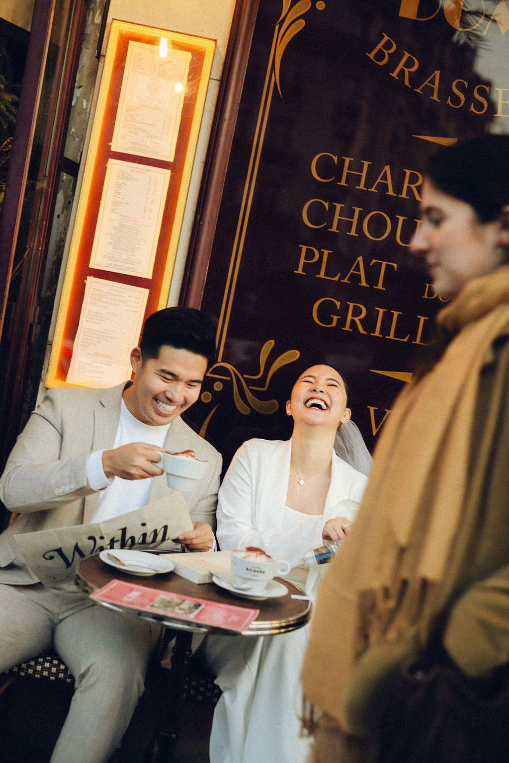 Paris Pre-Wedding Photoshoot with Eiﬀel Tower Louvre Museum Parisian Cafe Vintage Car Rooftop Night at Parisian Café pre-wedding photo