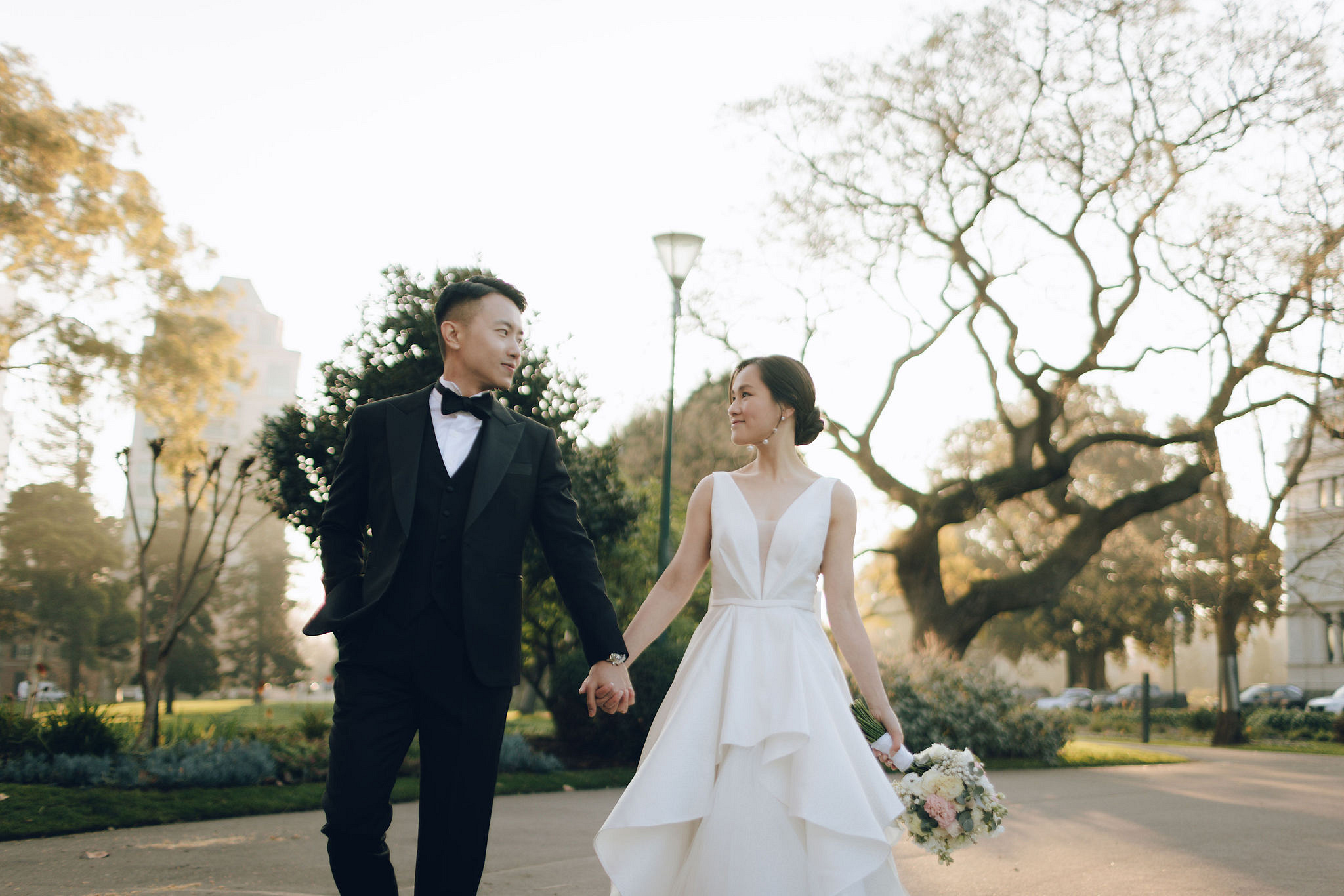 Melbourne Pre-Wedding Photoshoot | Cafe, Redwood Forest, City Streets & Carlton Gardens at Carlton Gardens pre-wedding photo