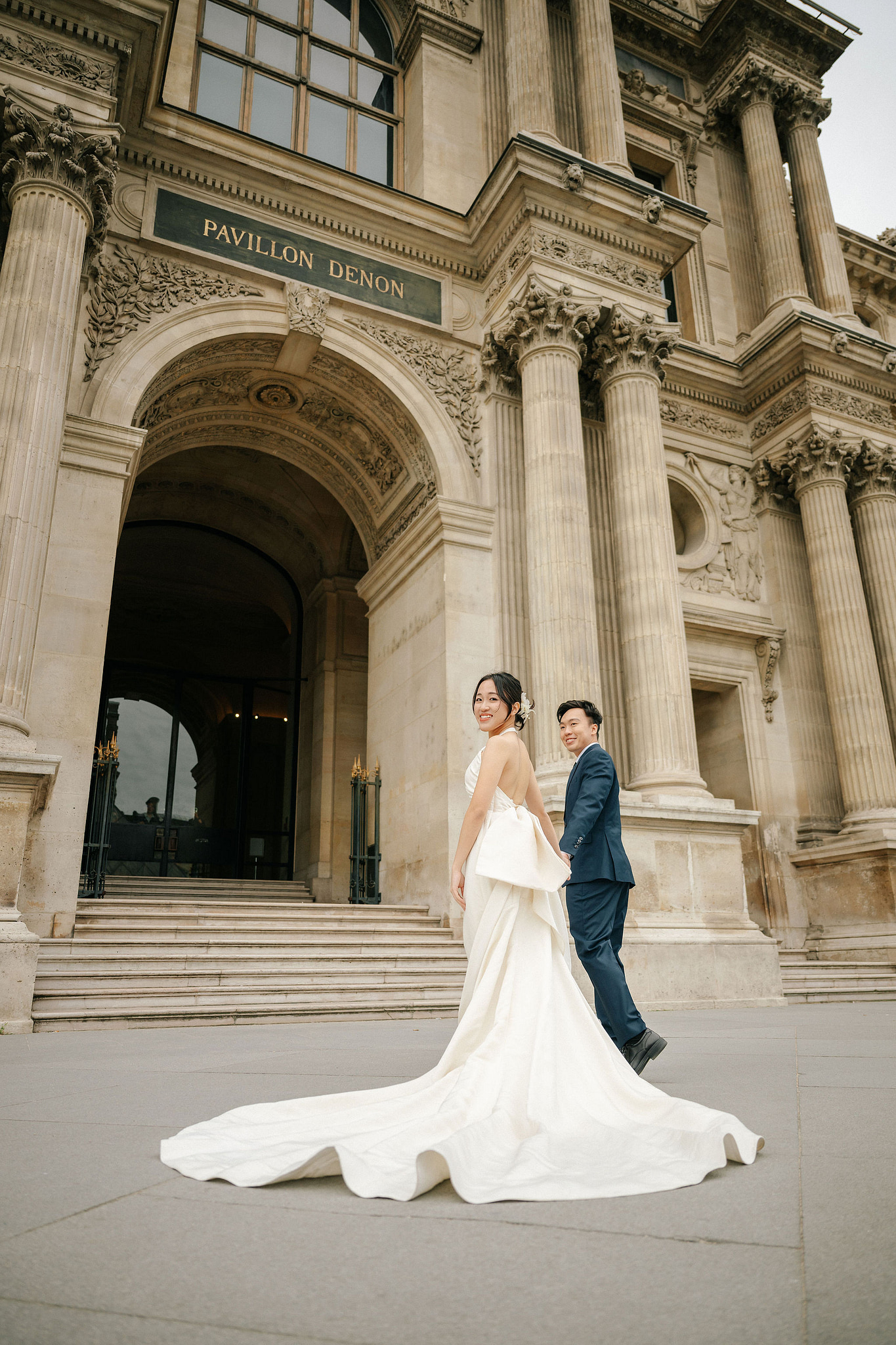 Paris Pre-Wedding Photoshoot | Place du Trocadéro, Bir-Hakeim Bridge, Louvre Pyramid, Tuileries Garden & Montmartre at Louvre Pyramid pre-wedding photo