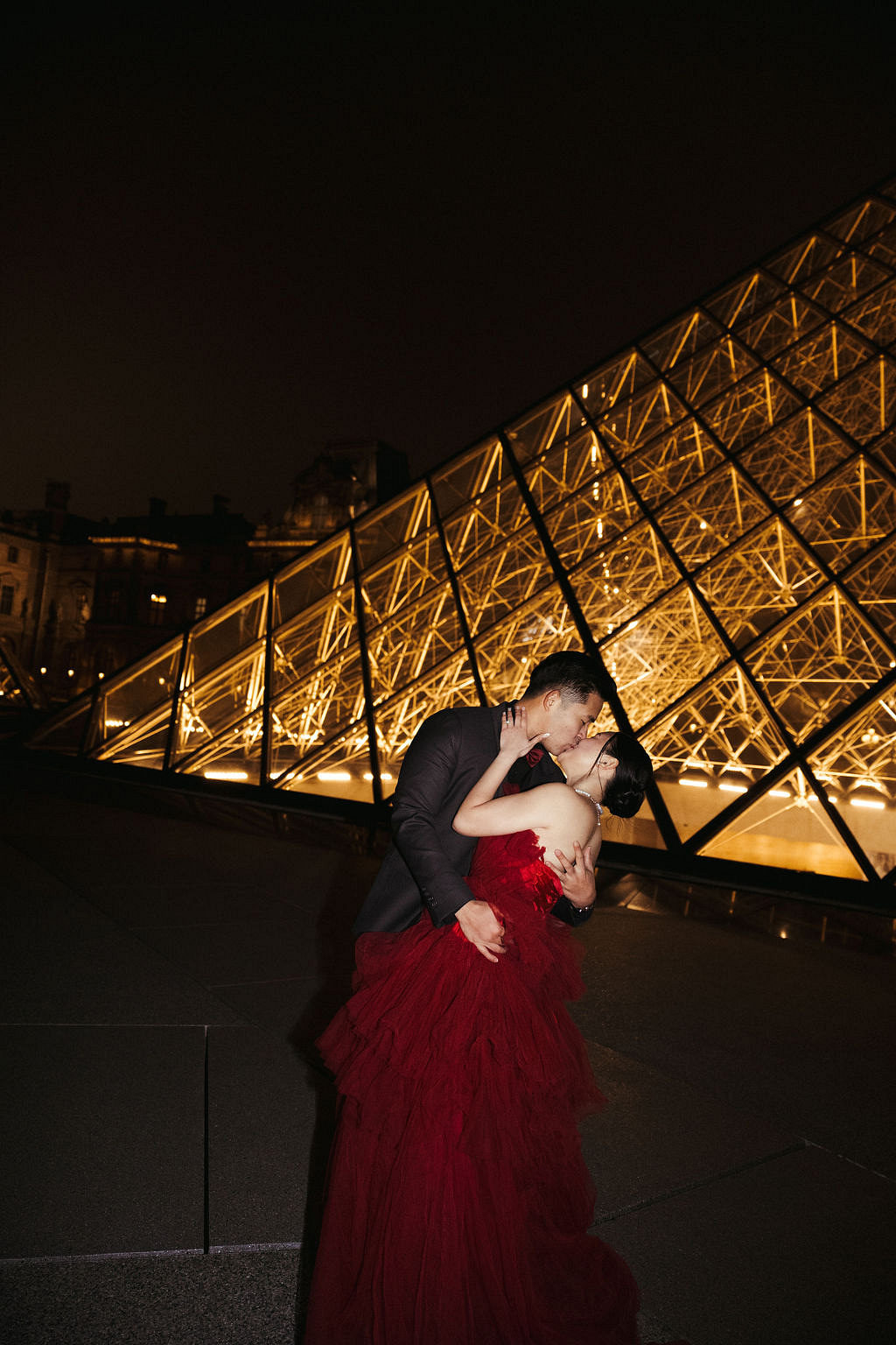 Paris Pre-Wedding Photoshoot with Eiﬀel Tower Louvre Museum Parisian Cafe Vintage Car Rooftop Night at Louvre Museum pre-wedding photo