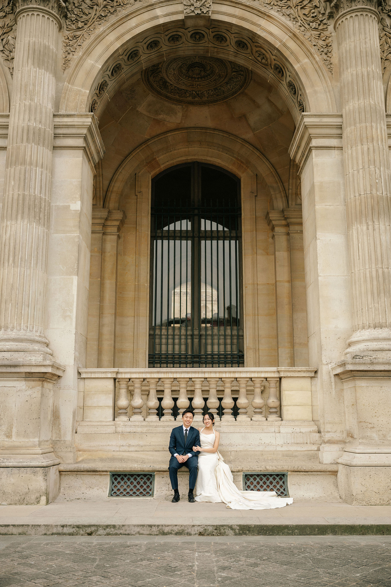 Paris Pre-Wedding Photoshoot | Place du Trocadéro, Bir-Hakeim Bridge, Louvre Pyramid, Tuileries Garden & Montmartre at Louvre Pyramid pre-wedding photo