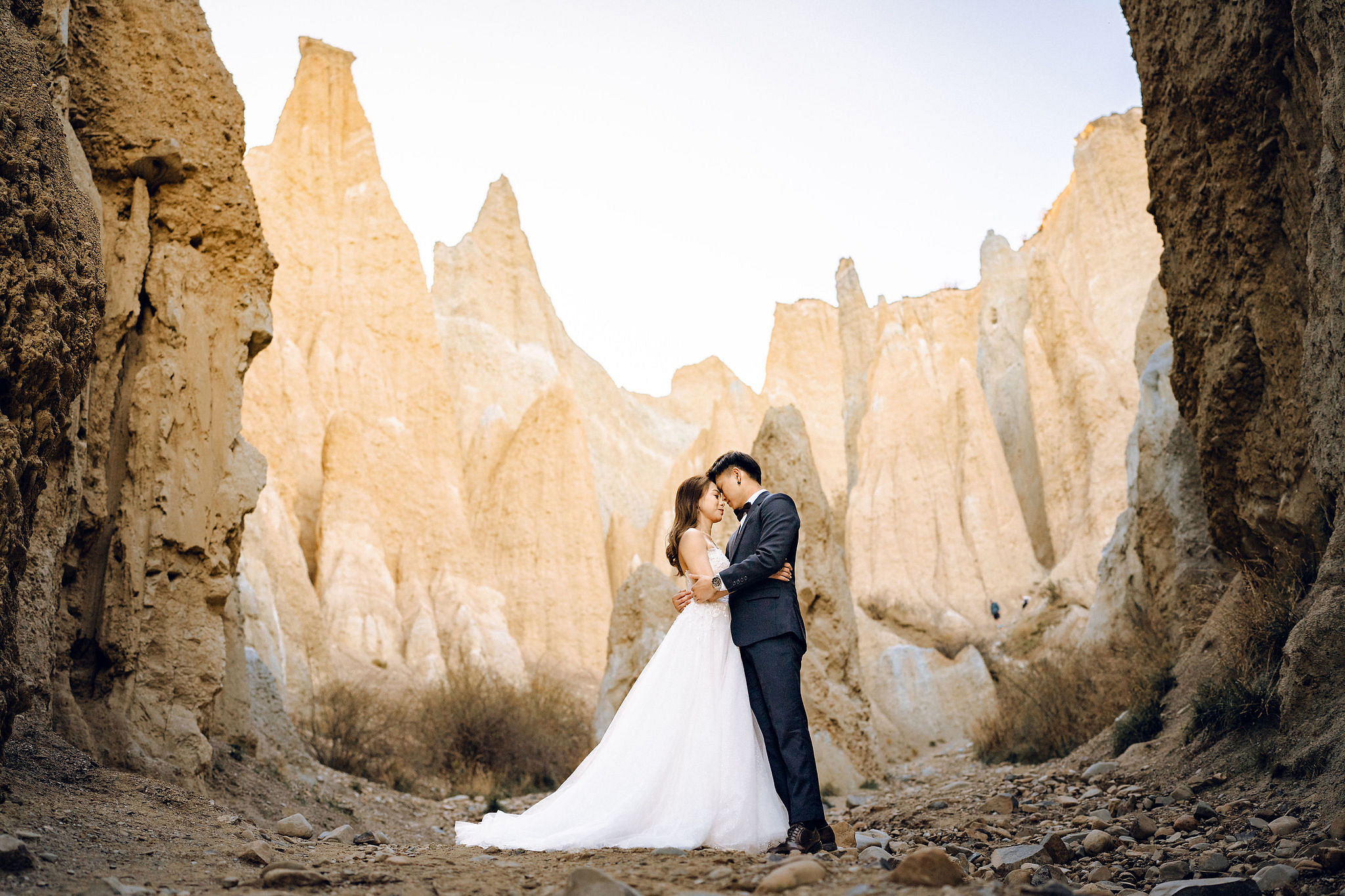 New Zealand Pre-Wedding Photoshoot | Alpaca Farm, Mt John, Lake Tekapo, Mount Cook National Park, Glacier Lake & Omarama Clay Cliffs at Omarama Clay Cliffs pre-wedding photo