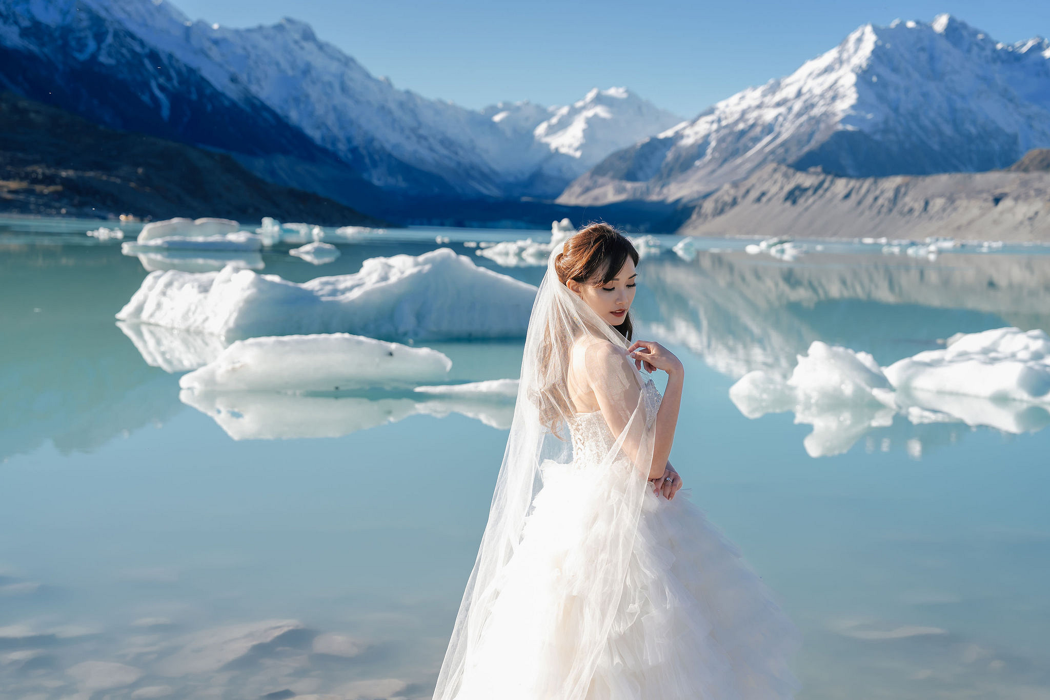 New Zealand Pre-Wedding Photoshoot | Coromandel Peak, Lake Wakatipu & Queenstown, Skippers Canyon, Lake Tekapo, Mount Cook National Park & Glacier at Glacier pre-wedding photo