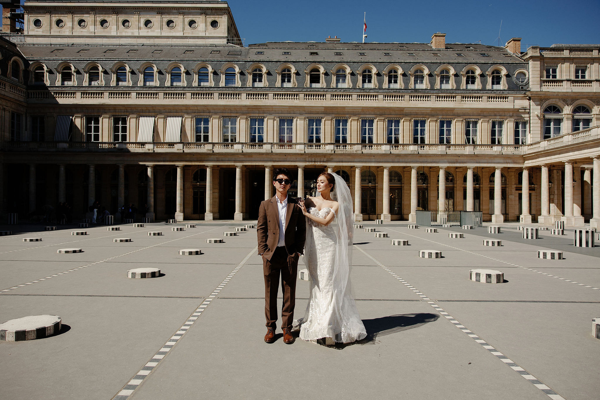 Paris Pre-Wedding Photoshoot | Place du Trocadéro, Bir-Hakeim Bridge, Sacré-Cœur Basilica, Parisian Café & Palais Royal at Palais Royal pre-wedding photo