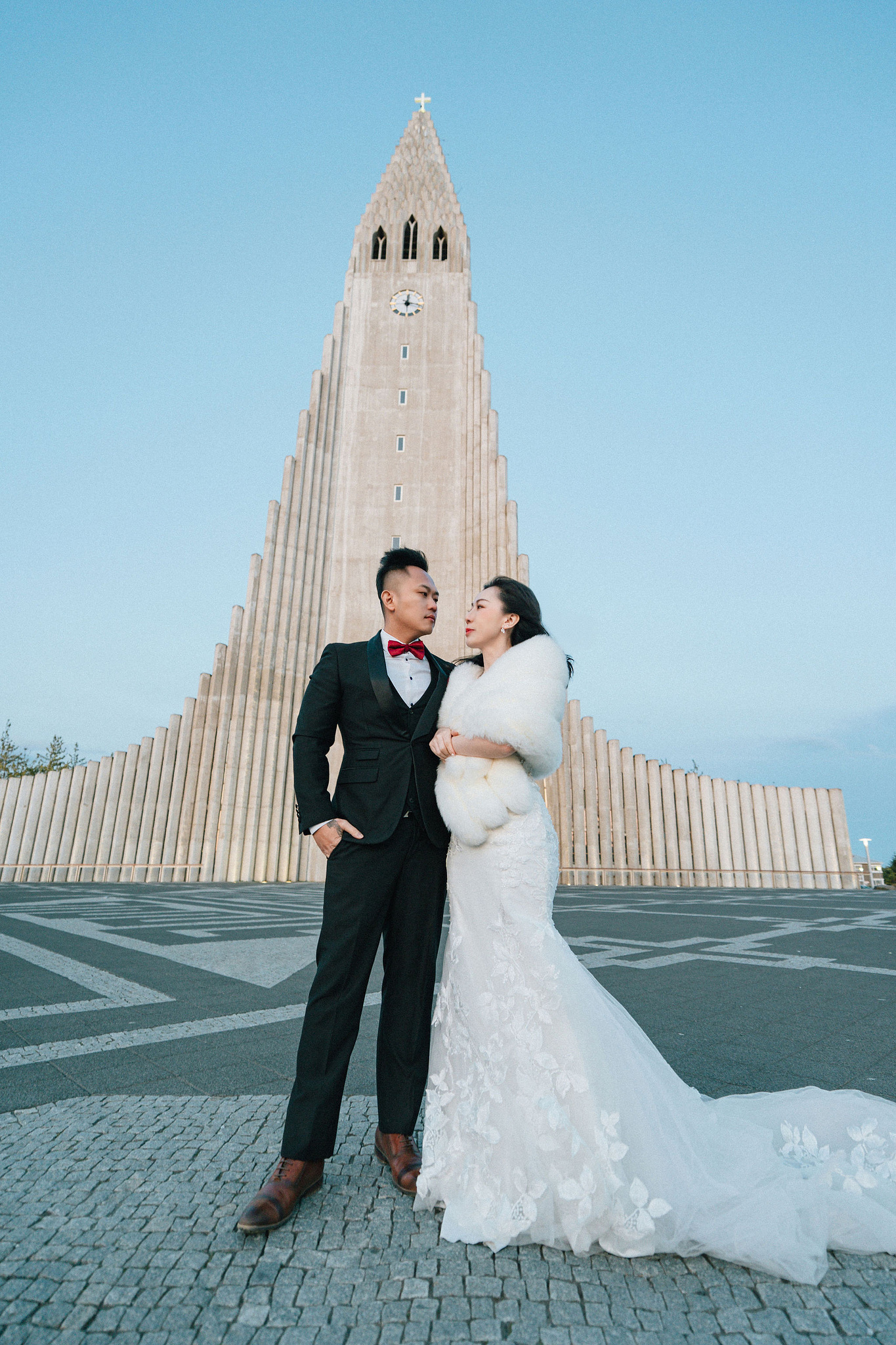 Iceland Pre-Wedding Photoshoot | Hallgrimskirkja, Skogafoss, DC Plane Wreck & Black Sand Beach at Hallgrimskirkja Church pre-wedding photo