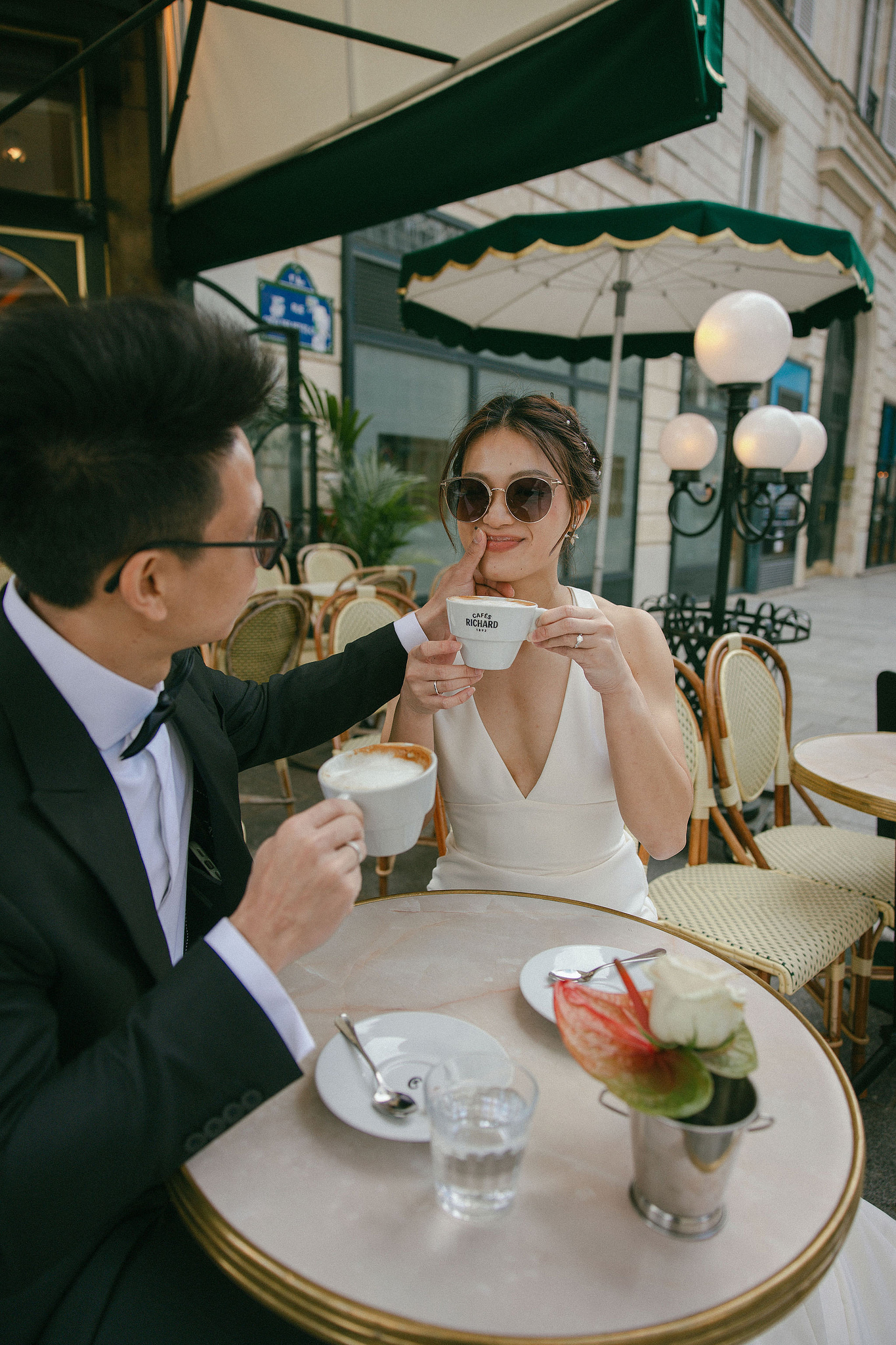 Paris Pre-Wedding Photoshoot | Place du Trocadéro, Luxembourg Gardens, Parisian Café, Louvre & Bir-Hakeim Bridge at Parisian Café pre-wedding photo