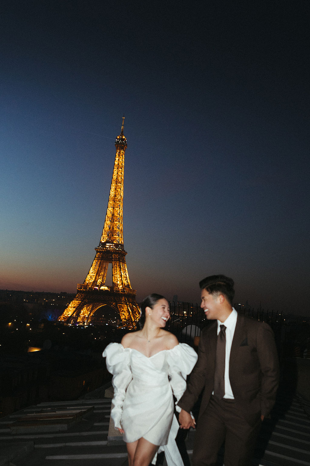 Paris Pre-Wedding Photoshoot with Eiﬀel Tower Louvre Museum Parisian Cafe Vintage Car Rooftop Night at Paris Rooftop pre-wedding photo