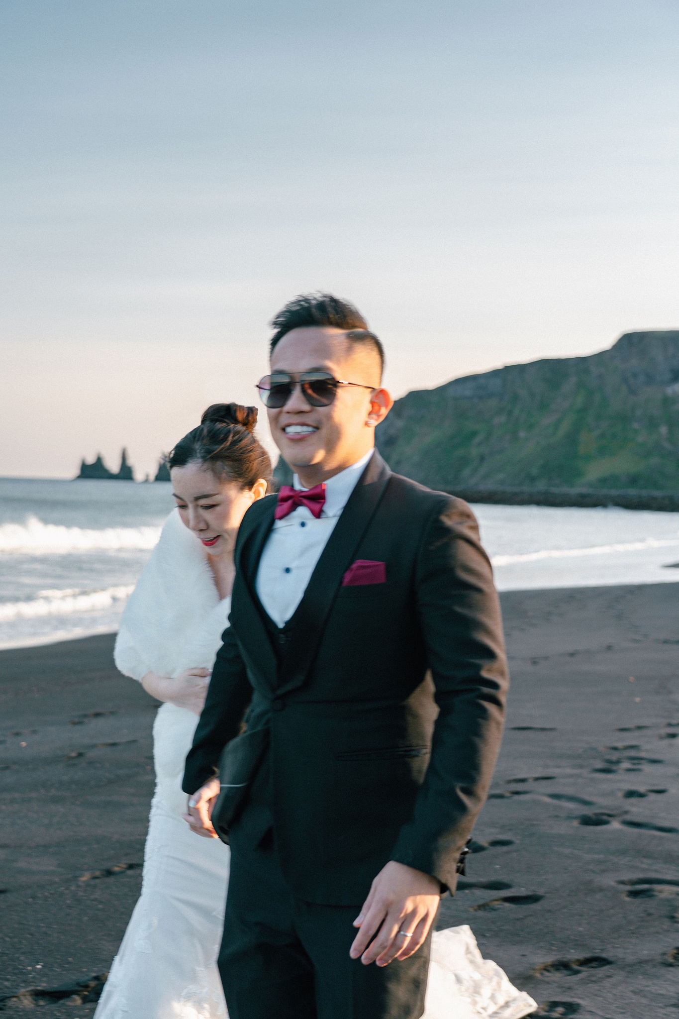 Iceland Pre-Wedding Photoshoot | Hallgrimskirkja, Skogafoss, DC Plane Wreck & Black Sand Beach at Black Sand Beach & Vik Church pre-wedding photo