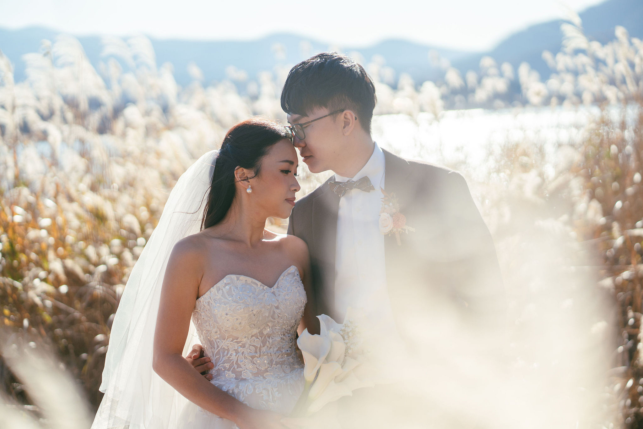 Tokyo & Mt Fuji Pre-Wedding Photoshoot | Asakusa Temple, Maple Corridor, Susuki Fields & Lake Kawaguchiko at Suzuki Fields pre-wedding photo