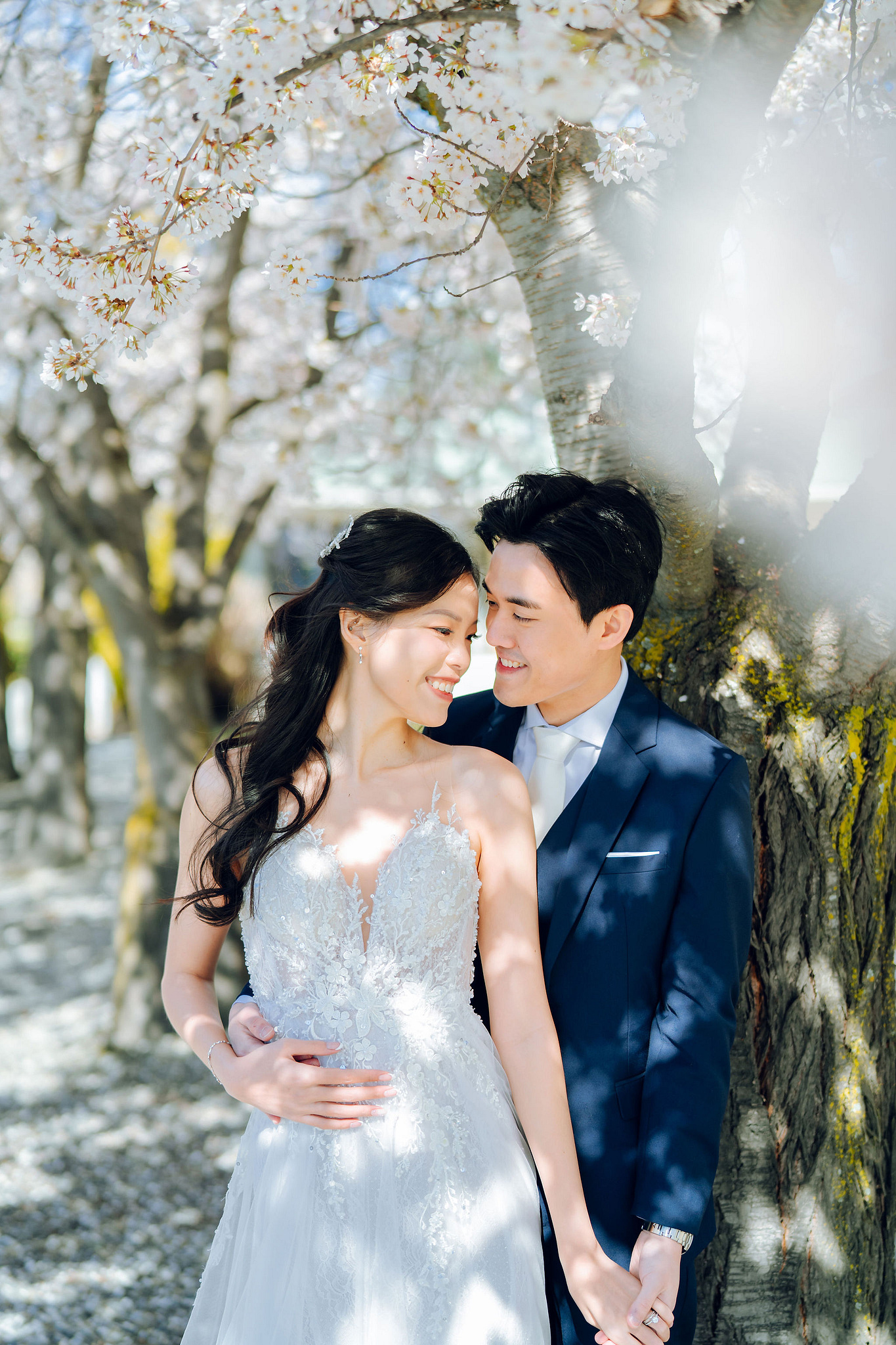 New Zealand Pre-Wedding Photoshoot | Cherry Blossoms, Coromandel Peak & Lake Wakatipu at Cherry Blossoms pre-wedding photo