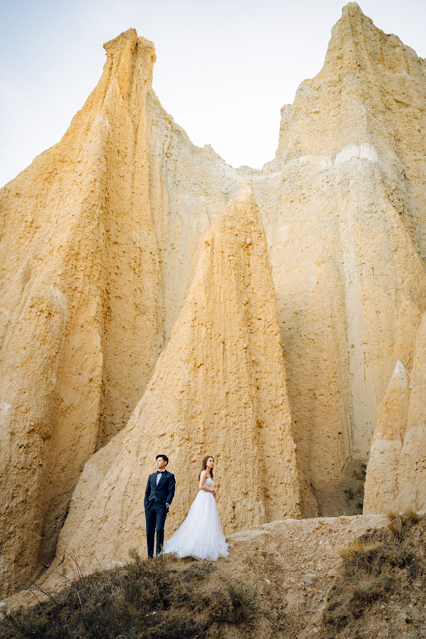 New Zealand Pre-Wedding Photoshoot | Alpaca Farm, Mt John, Lake Tekapo, Mount Cook National Park, Glacier Lake & Omarama Clay Cliffs at Omarama Clay Cliffs pre-wedding photo