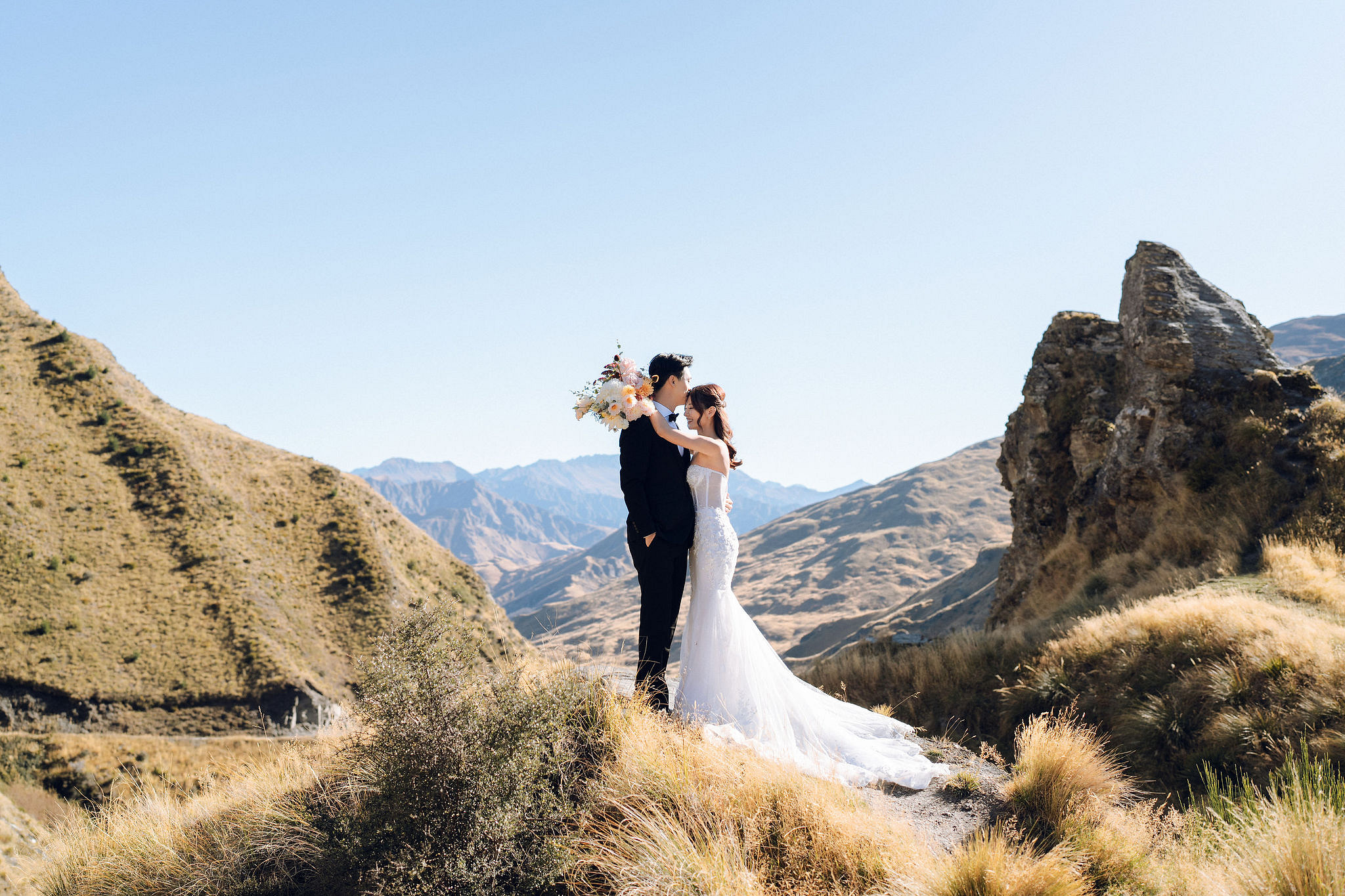 New Zealand Autumn Pre-Wedding Photoshoot Twin Peak Skippers Canyon Alpaca Farm Hilltop Cardrona Night Shoot Kombi Van at Skippers Canyon pre-wedding photo