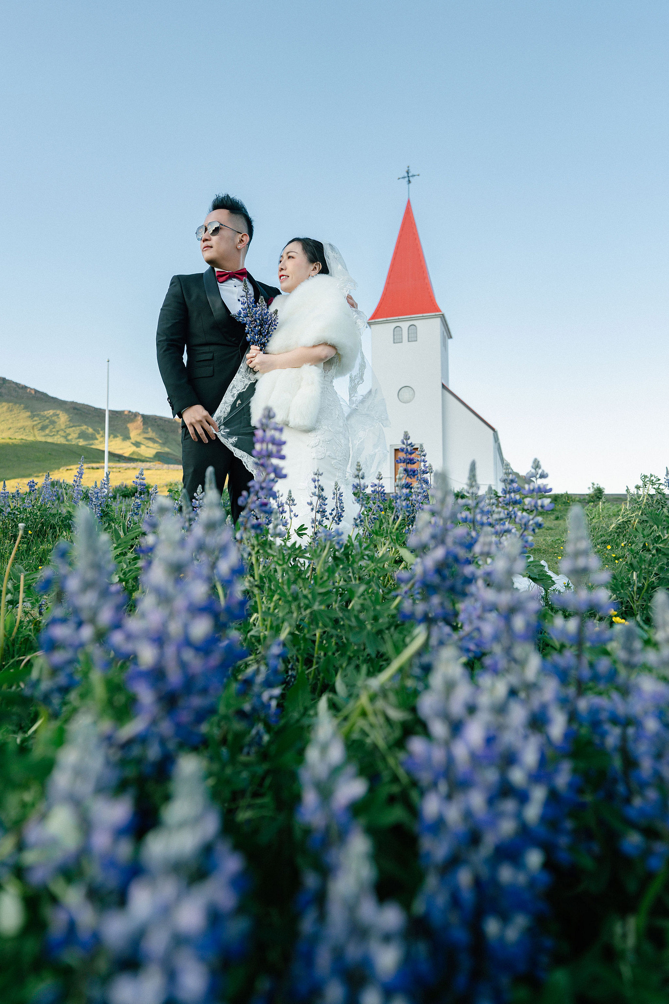 Iceland Pre-Wedding Photoshoot | Hallgrimskirkja, Skogafoss, DC Plane Wreck & Black Sand Beach at Black Sand Beach & Vik Church pre-wedding photo