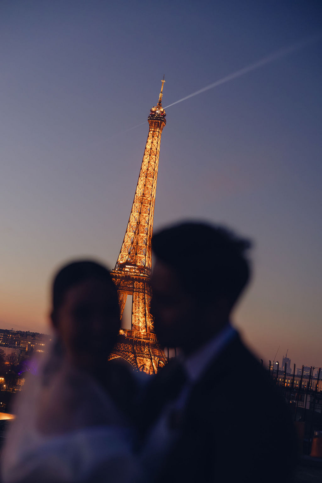 Paris Pre-Wedding Photoshoot with Eiﬀel Tower Louvre Museum Parisian Cafe Vintage Car Rooftop Night at Paris Rooftop pre-wedding photo