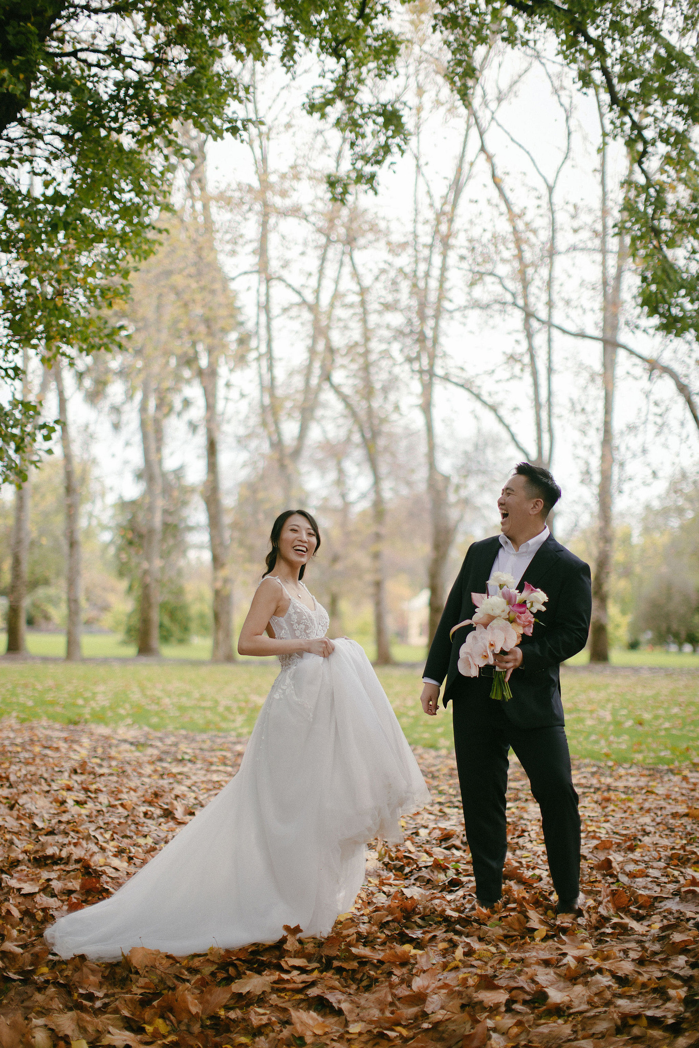 Melbourne Pre-Wedding Photoshoot | Parliament House, Fitzroy Gardens, Melbourne Streets & Half Moon Bay at Fitzroy Gardens pre-wedding photo