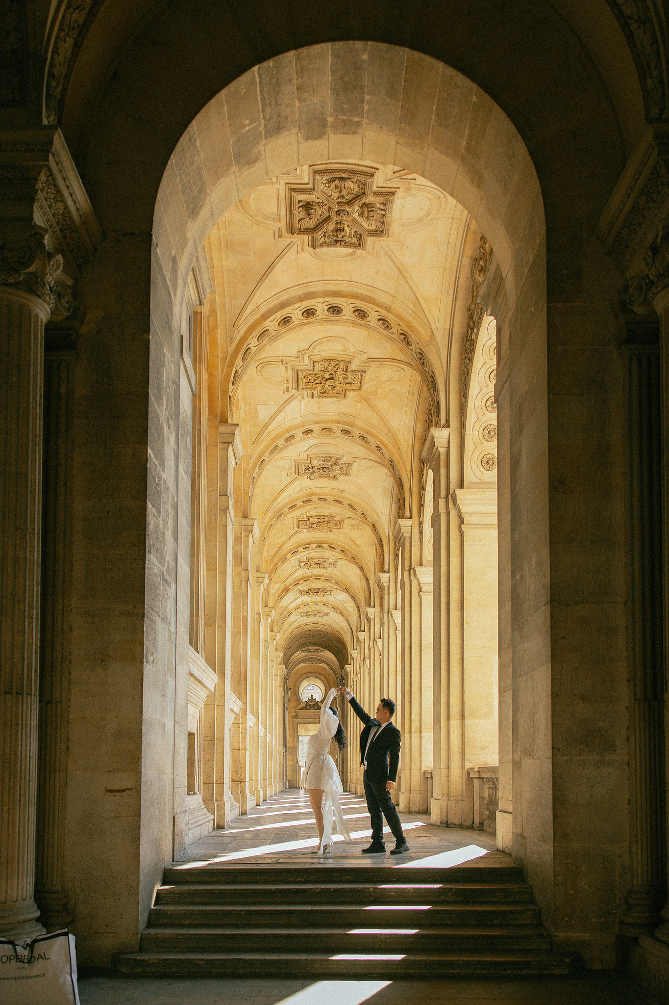 Paris Autumn Pre-Wedding Photoshoot | Avenue de Camoëns, Tuileries Garden, Louvre, Pont Alexandre III & Bir-Hakeim Bridge at Louvre pre-wedding photo