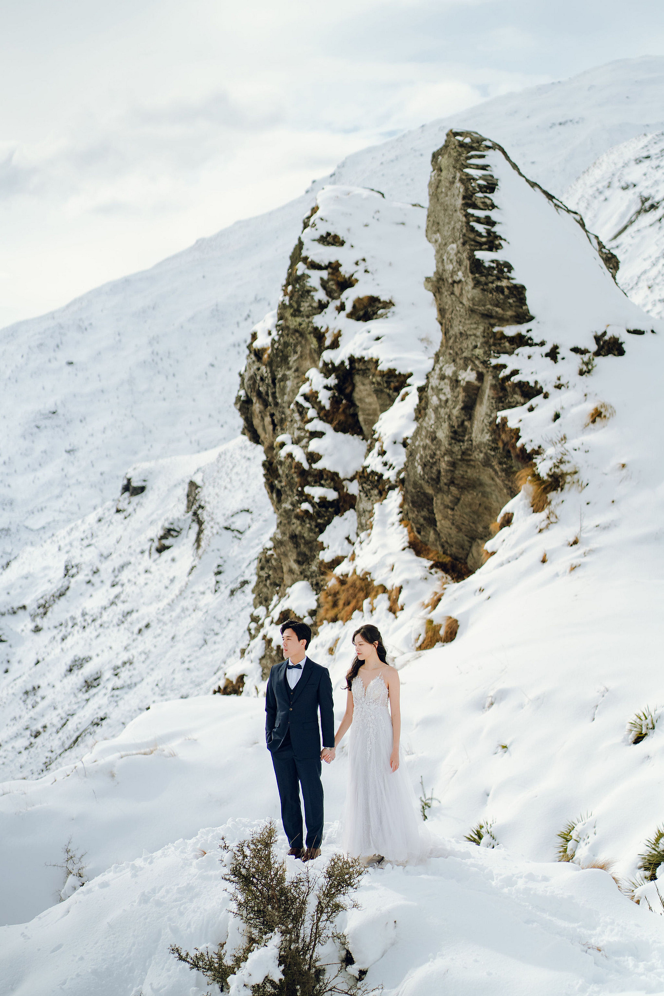 New Zealand Pre-Wedding Photoshoot | Cherry Blossoms, Coromandel Peak & Lake Wakatipu at Coromandel Peak pre-wedding photo