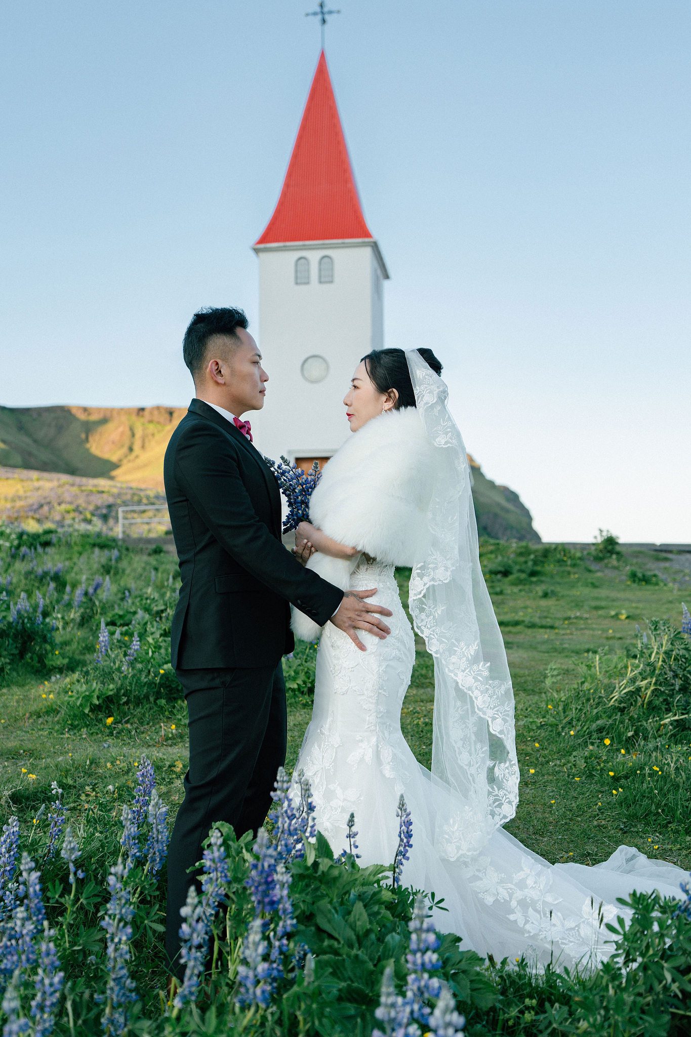 Iceland Pre-Wedding Photoshoot | Hallgrimskirkja, Skogafoss, DC Plane Wreck & Black Sand Beach at Black Sand Beach & Vik Church pre-wedding photo