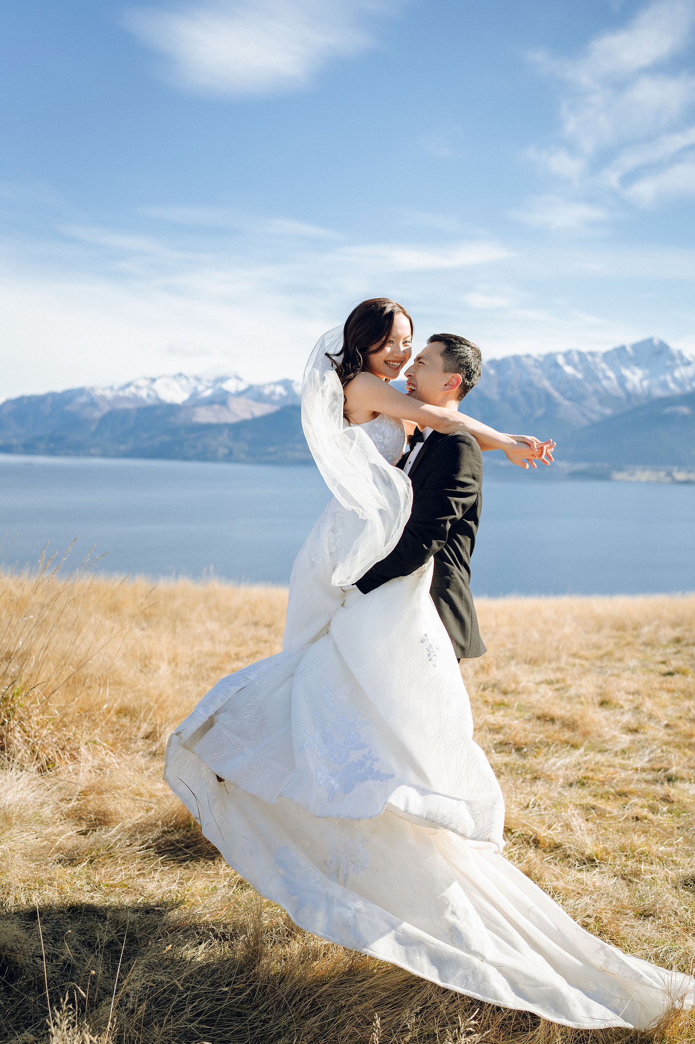 New Zealand Pre-Wedding Photoshoot with Lake Wakatipu, Skippers Canyon, Lake Tekapo, Mount Cook, and Omarama Clay Cliffs at Lake Wakatipu pre-wedding photo