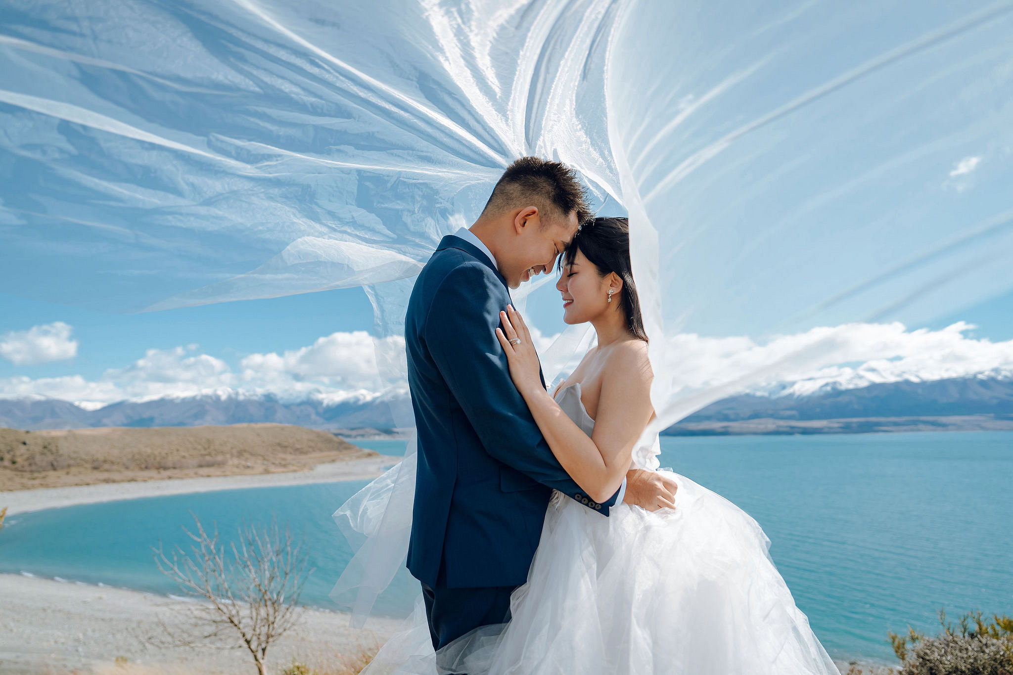 New Zealand Pre-Wedding Photoshoot | Lake Tekapo, Mount Cook, Tasman Glacier & Lake Wakatipu at Lake Tekapo pre-wedding photo