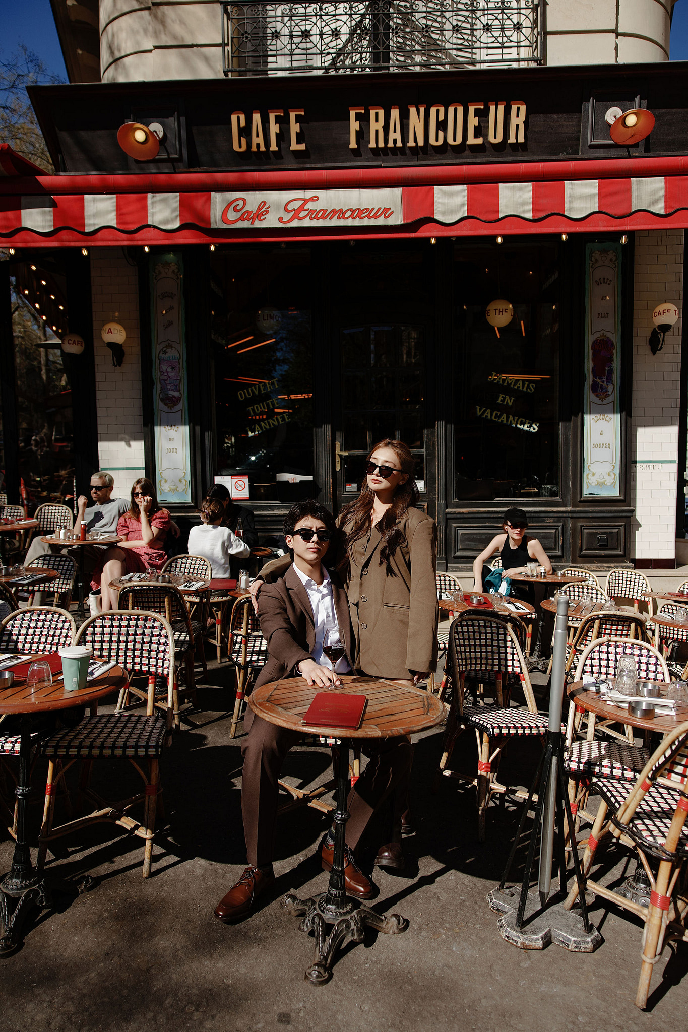Paris Pre-Wedding Photoshoot | Place du Trocadéro, Bir-Hakeim Bridge, Sacré-Cœur Basilica, Parisian Café & Palais Royal at Parisian Café pre-wedding photo