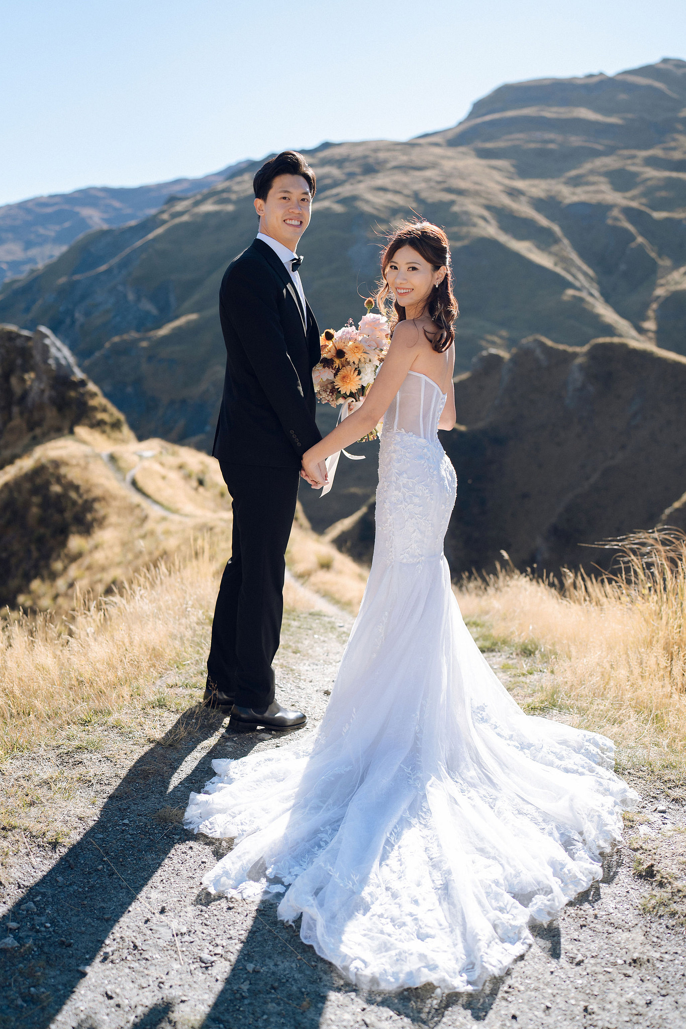 New Zealand Autumn Pre-Wedding Photoshoot Twin Peak Skippers Canyon Alpaca Farm Hilltop Cardrona Night Shoot Kombi Van at Skippers Canyon pre-wedding photo