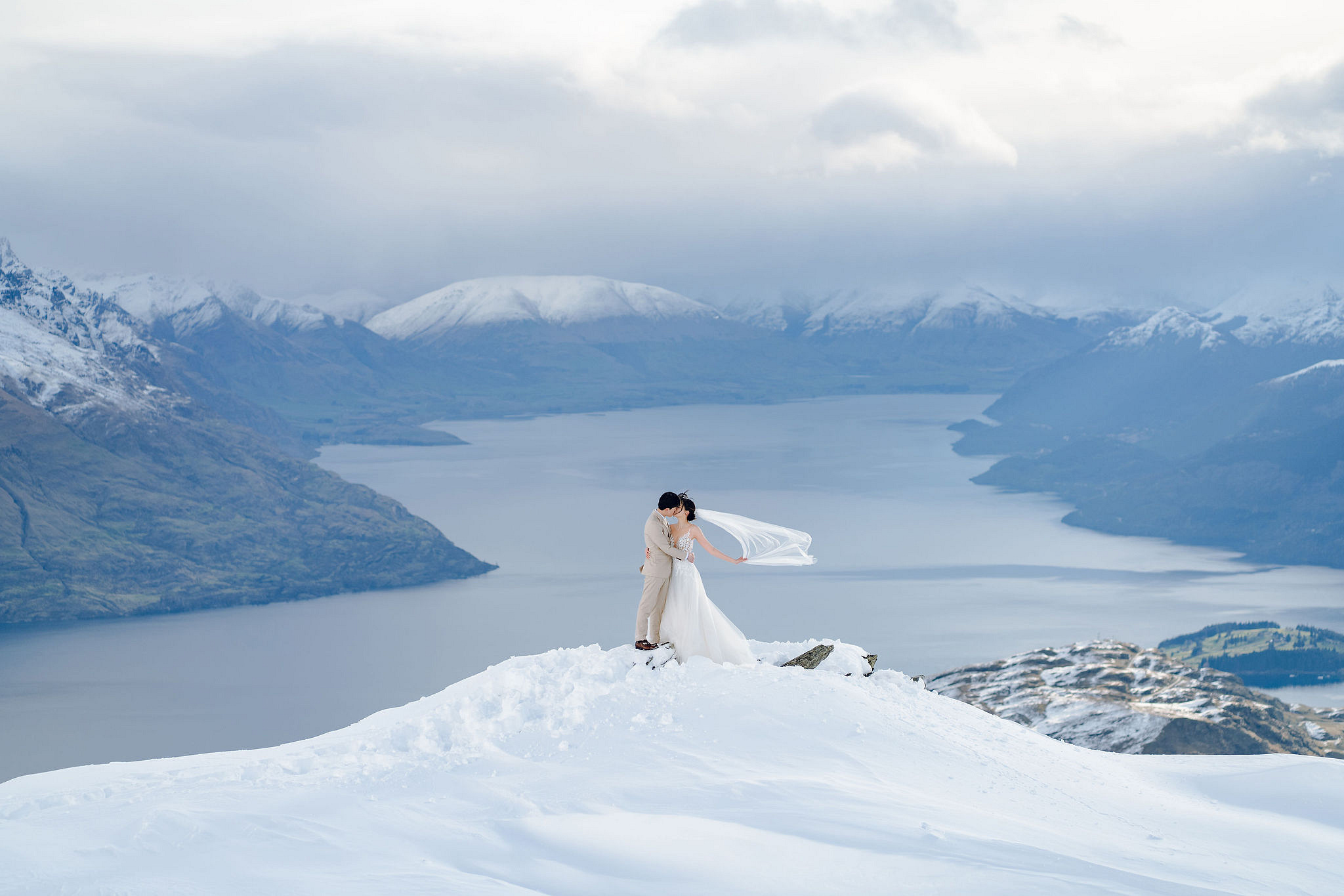New Zealand Pre-Wedding Photoshoot | Cherry Blossoms, Coromandel Peak & Lake Wakatipu at Coromandel Peak pre-wedding photo