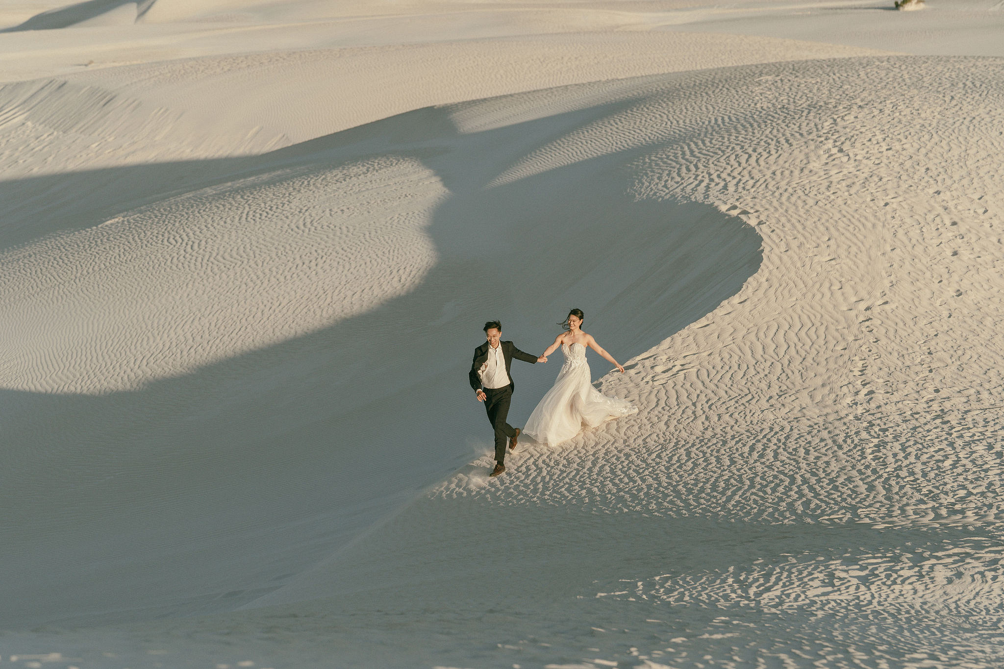 Perth Pre-Wedding Photoshoot | Wanneroo Pines, Yanchep National Park, Lancelin & Lancelin Beach at Lancelin Sand Dunes pre-wedding photo