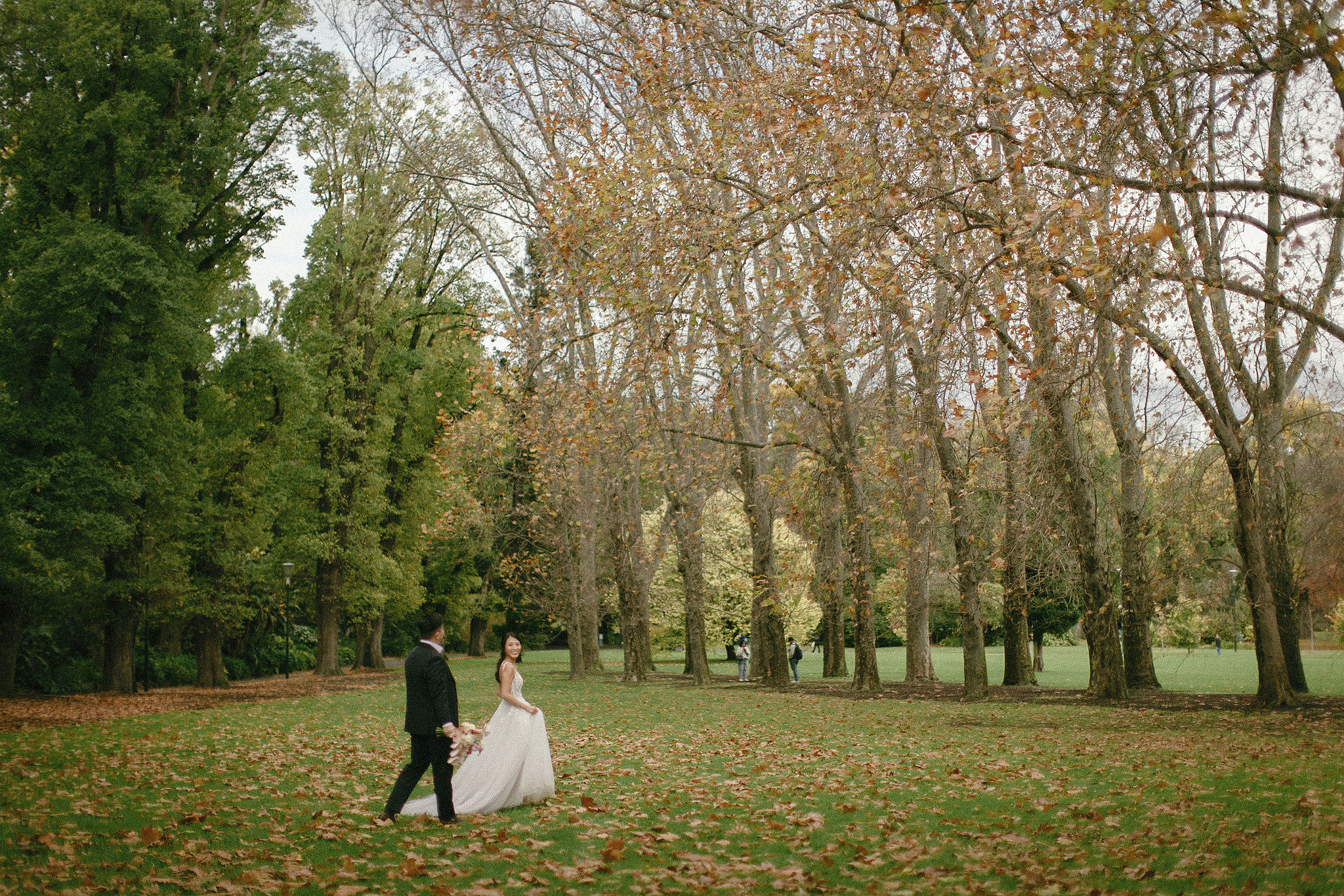 Melbourne Pre-Wedding Photoshoot | Parliament House, Fitzroy Gardens, Melbourne Streets & Half Moon Bay at Fitzroy Gardens pre-wedding photo