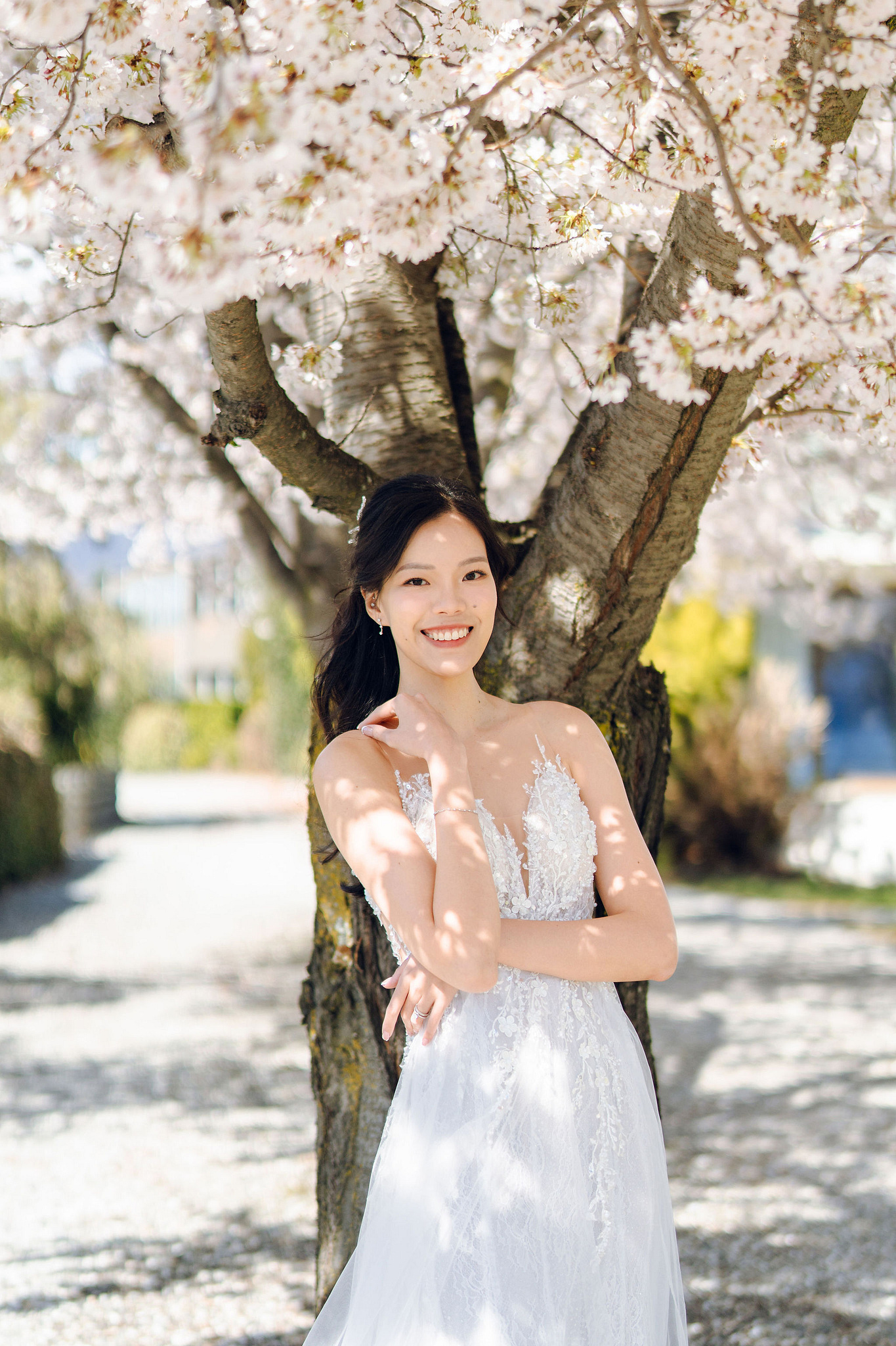 New Zealand Pre-Wedding Photoshoot | Cherry Blossoms, Coromandel Peak & Lake Wakatipu at Cherry Blossoms pre-wedding photo