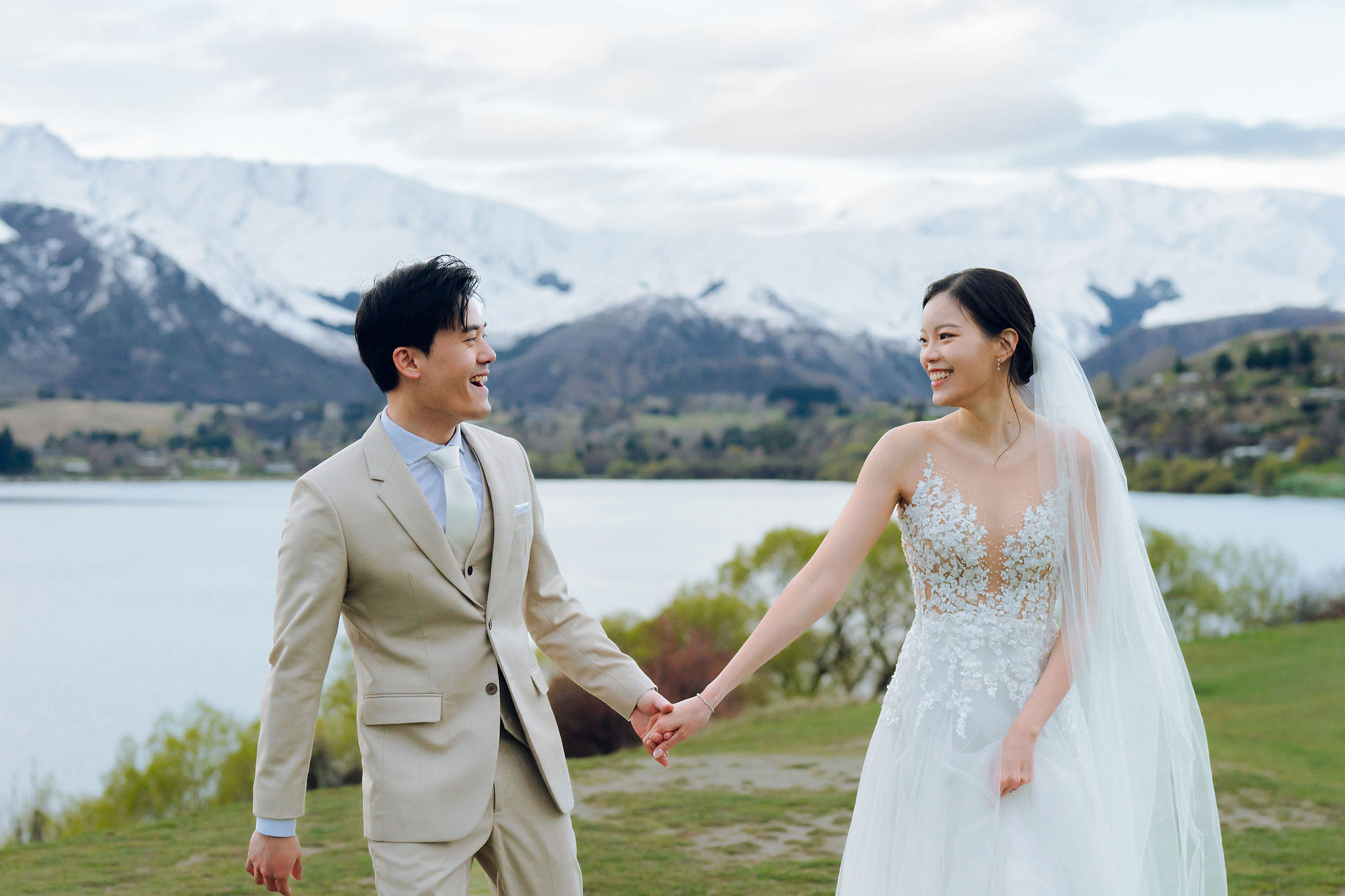 New Zealand Pre-Wedding Photoshoot | Cherry Blossoms, Coromandel Peak & Lake Wakatipu at Lake Wakatipu & Queenstown Highway pre-wedding photo