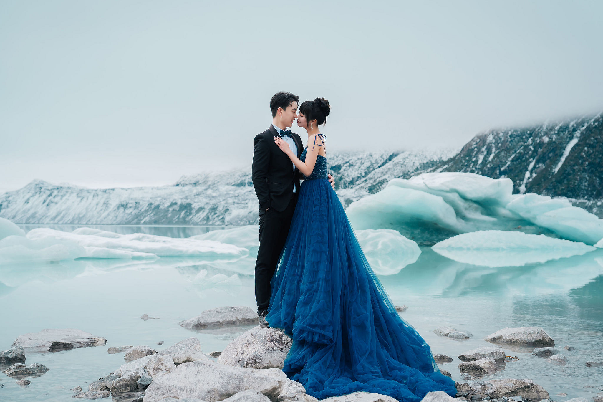 New Zealand Pre-Wedding Photoshoot | Lake Wakatipu, Fog Peak, Lake Tekapo, Glacier & Mount Cook National Park at Glacier pre-wedding photo