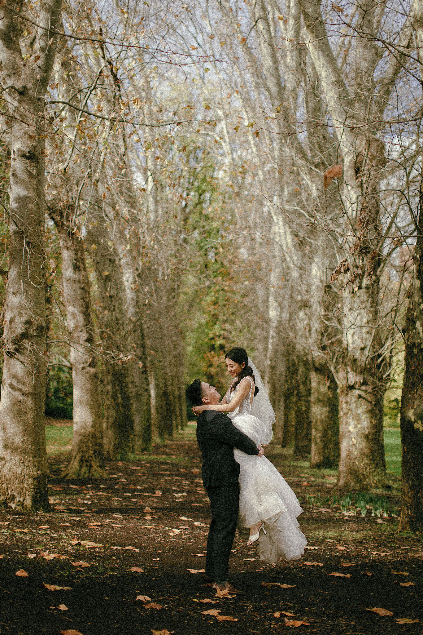 Melbourne Pre-Wedding Photoshoot | Parliament House, Fitzroy Gardens, Melbourne Streets & Half Moon Bay at Fitzroy Gardens pre-wedding photo
